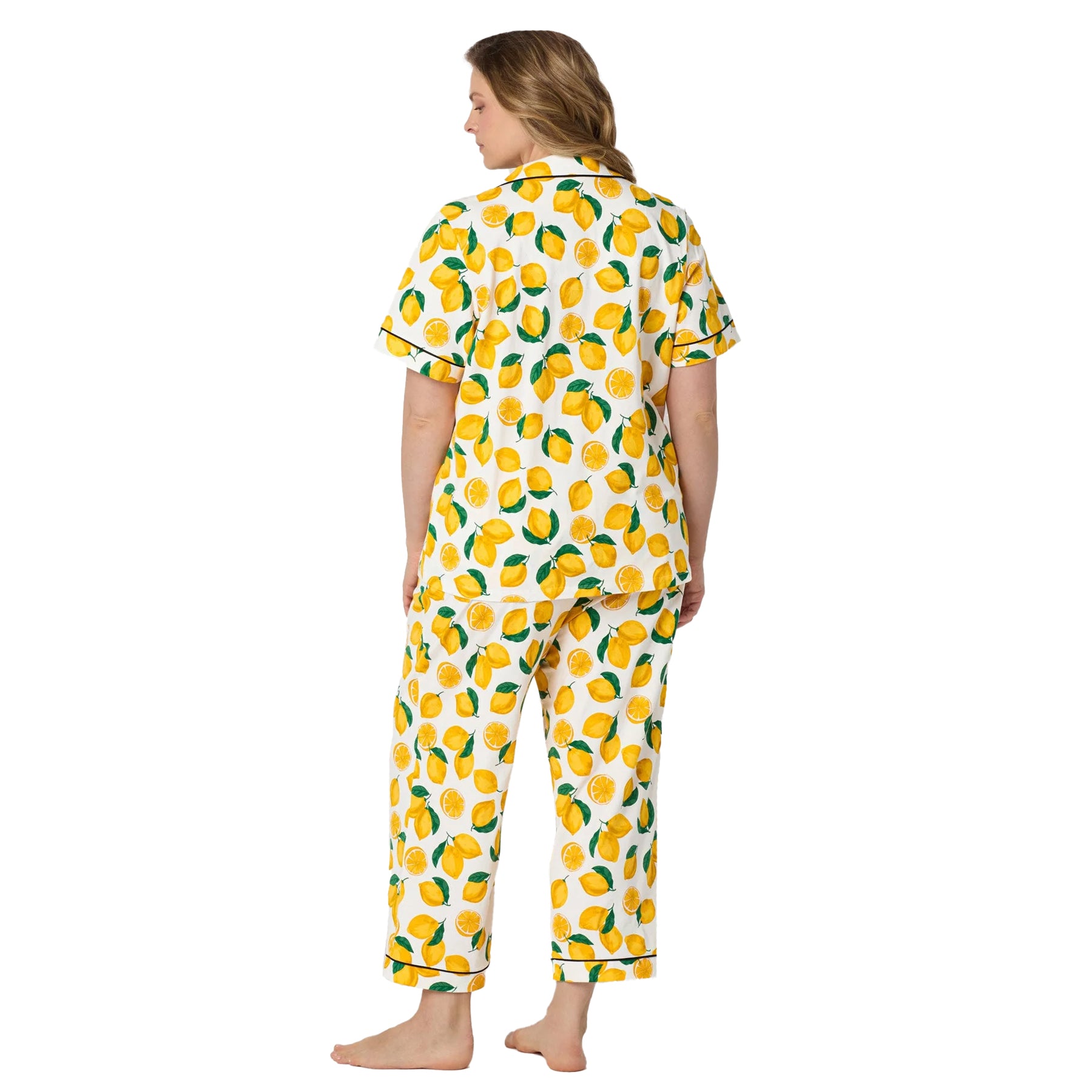 Back view of plus size lemon print sleepwear set with cropped pants and short sleeve button-up top.