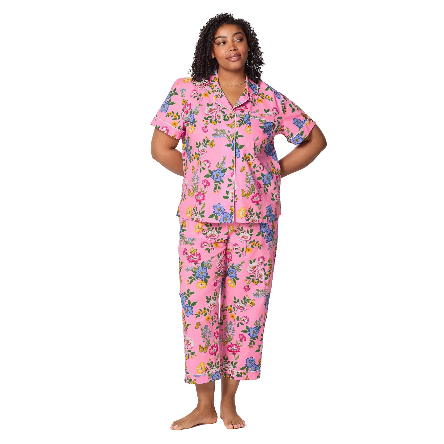 Plus size Bed Head pajama PJ set in bright pink floral print with short sleeve sleep top and cropped pants.