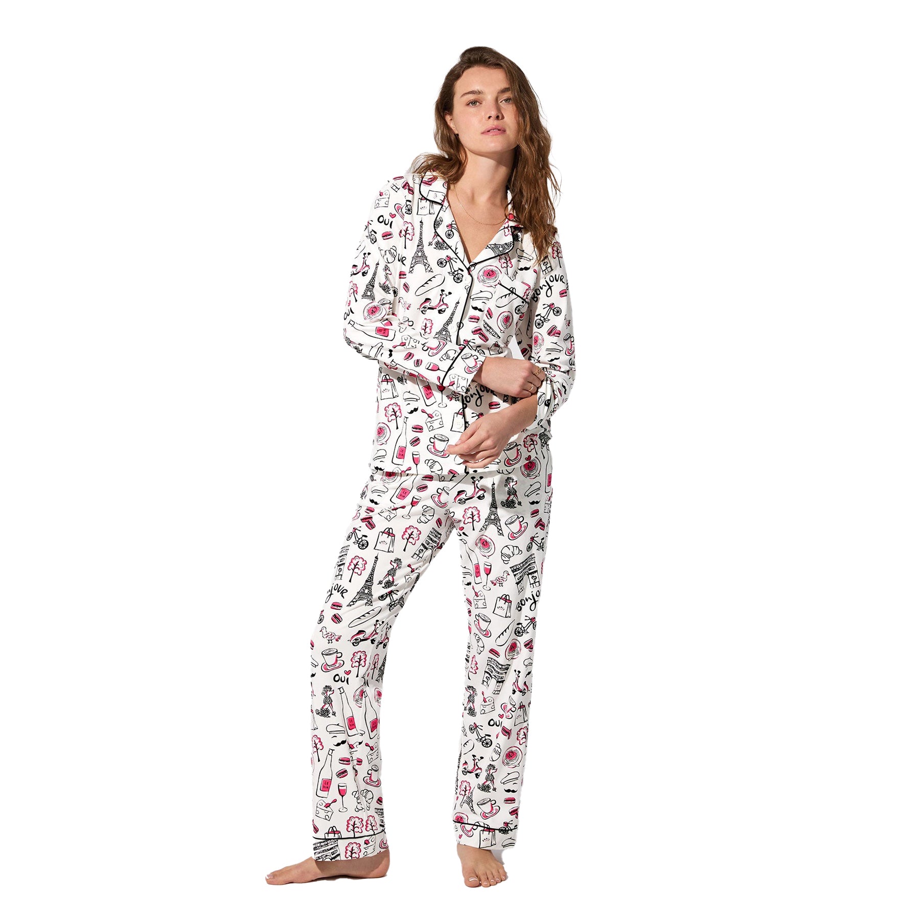 White Paris-themed pyjama set with black piping and pink accents, front view on model