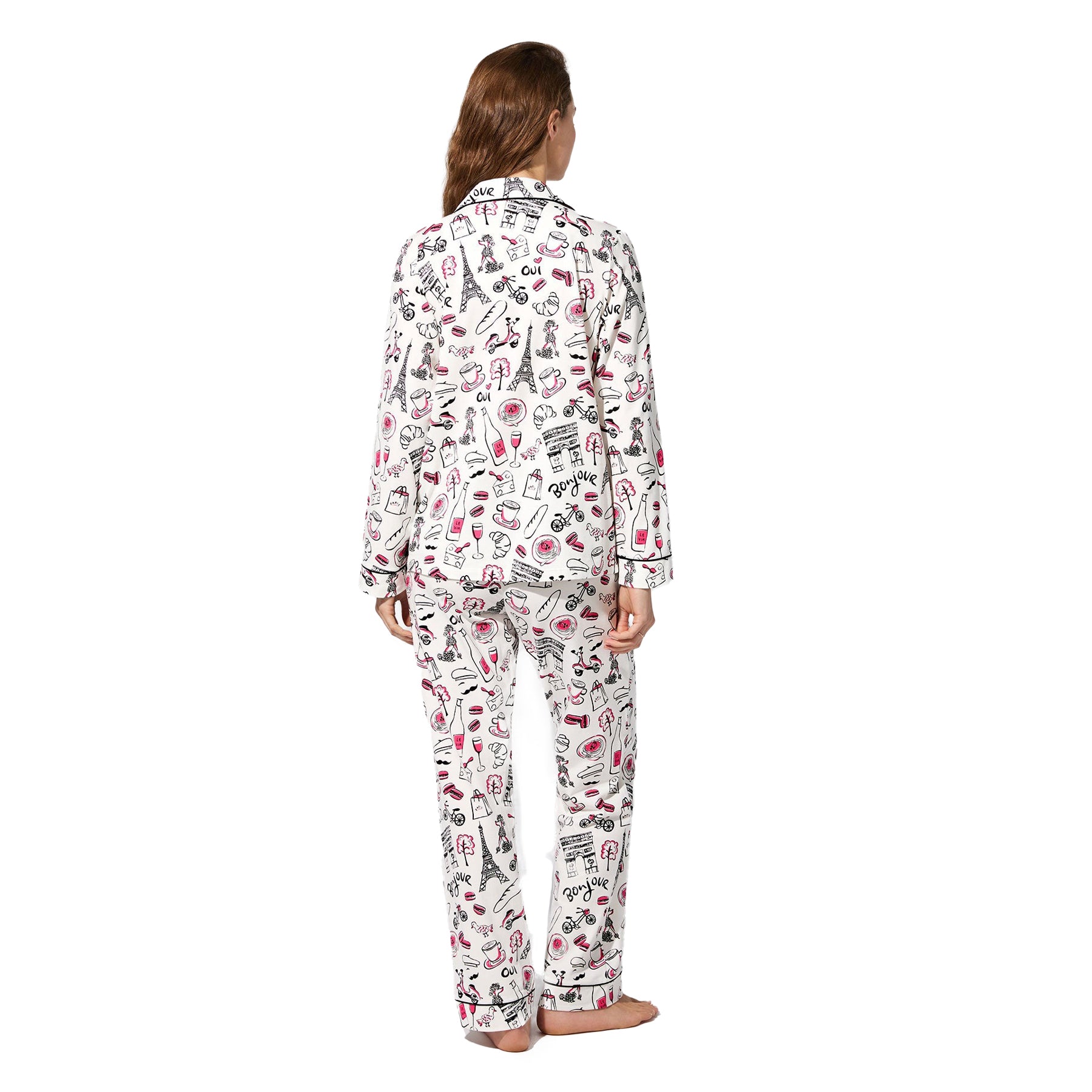 White pyjama set with Paris-themed print and black piping, back view on model