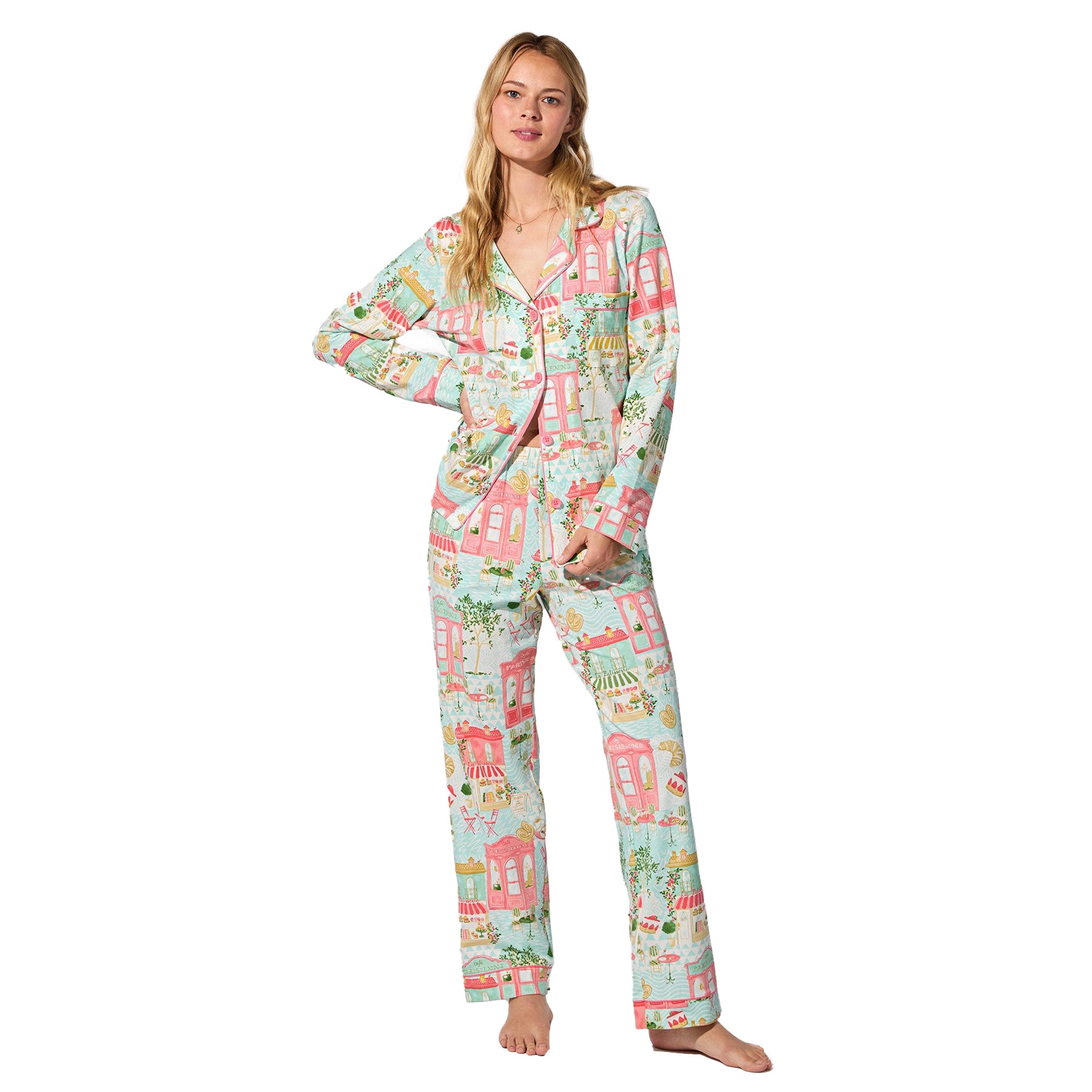 Light aqua Parisian-print cotton pyjama set with pink piping, front view on model