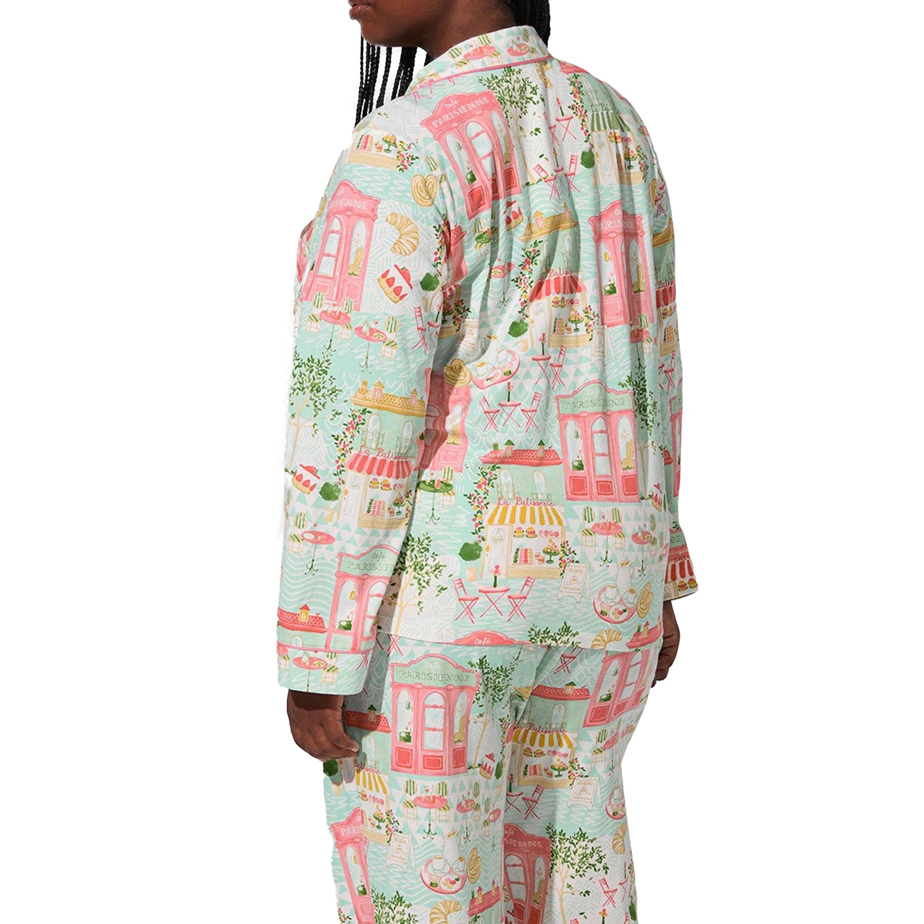 Light aqua Parisian café and bakery print pyjama set with pink piping, back view on model