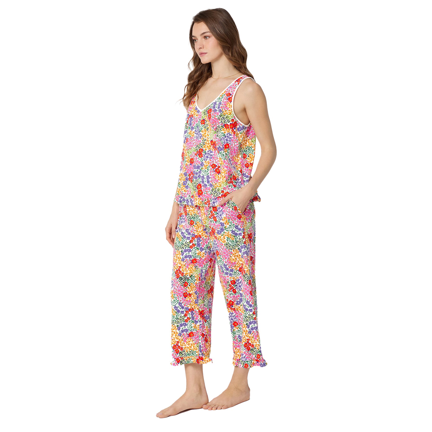 Side view of bright multicolour floral pajama set with relaxed sleeveless top and flowy cropped wide leg pants.