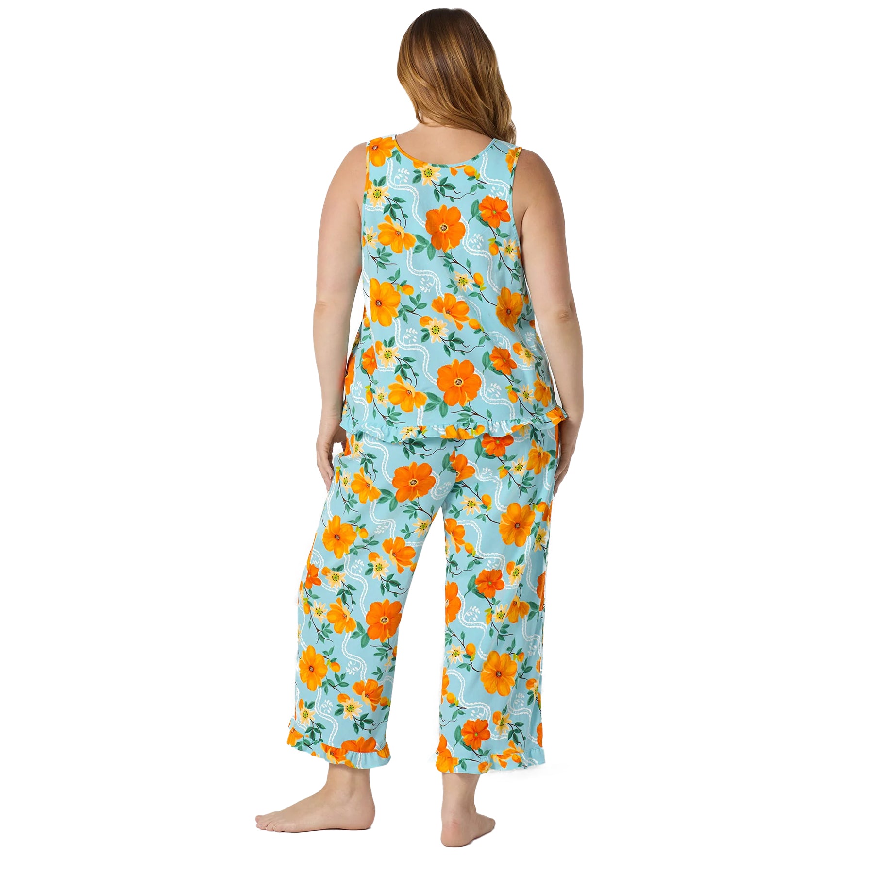 Back view of a sleeveless aqua floral pyjama set with bright orange flowers, relaxed fit tank top, and cropped lounge pants.