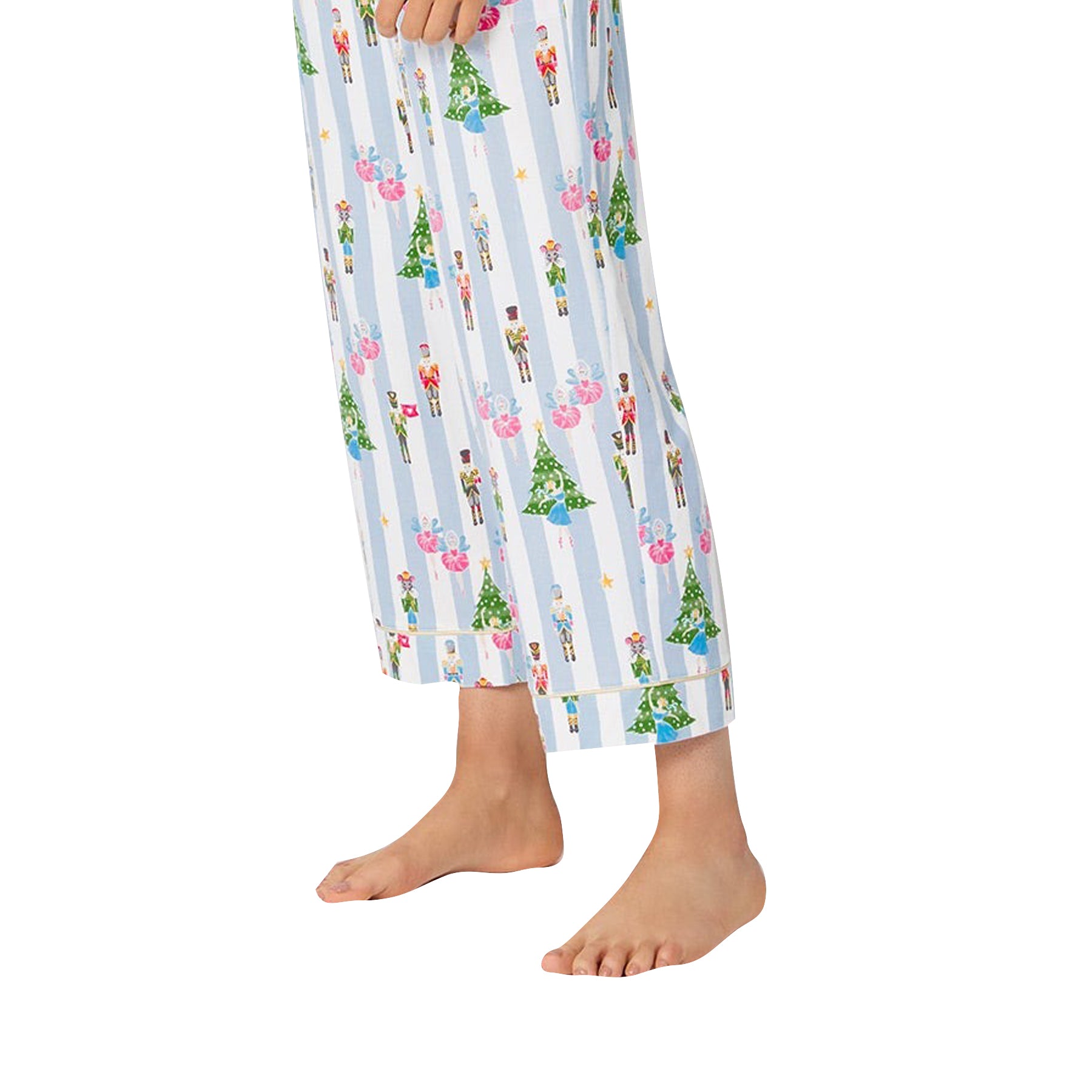 Colorful pajama pants with cartoon characters on a white background