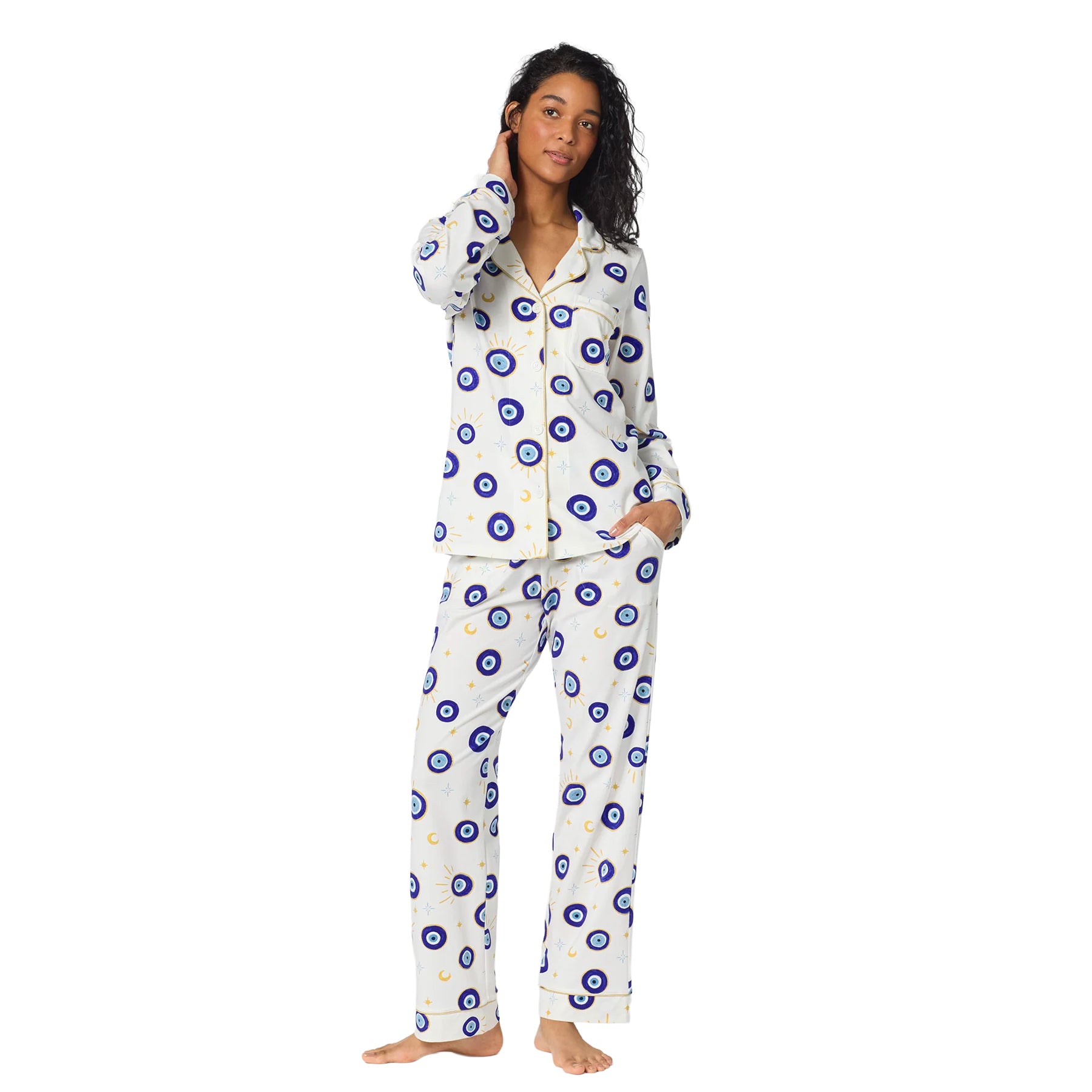 Front view of BedHead white classic pajama set with blue evil eye and celestial print, contrast piping and relaxed-fit pants.