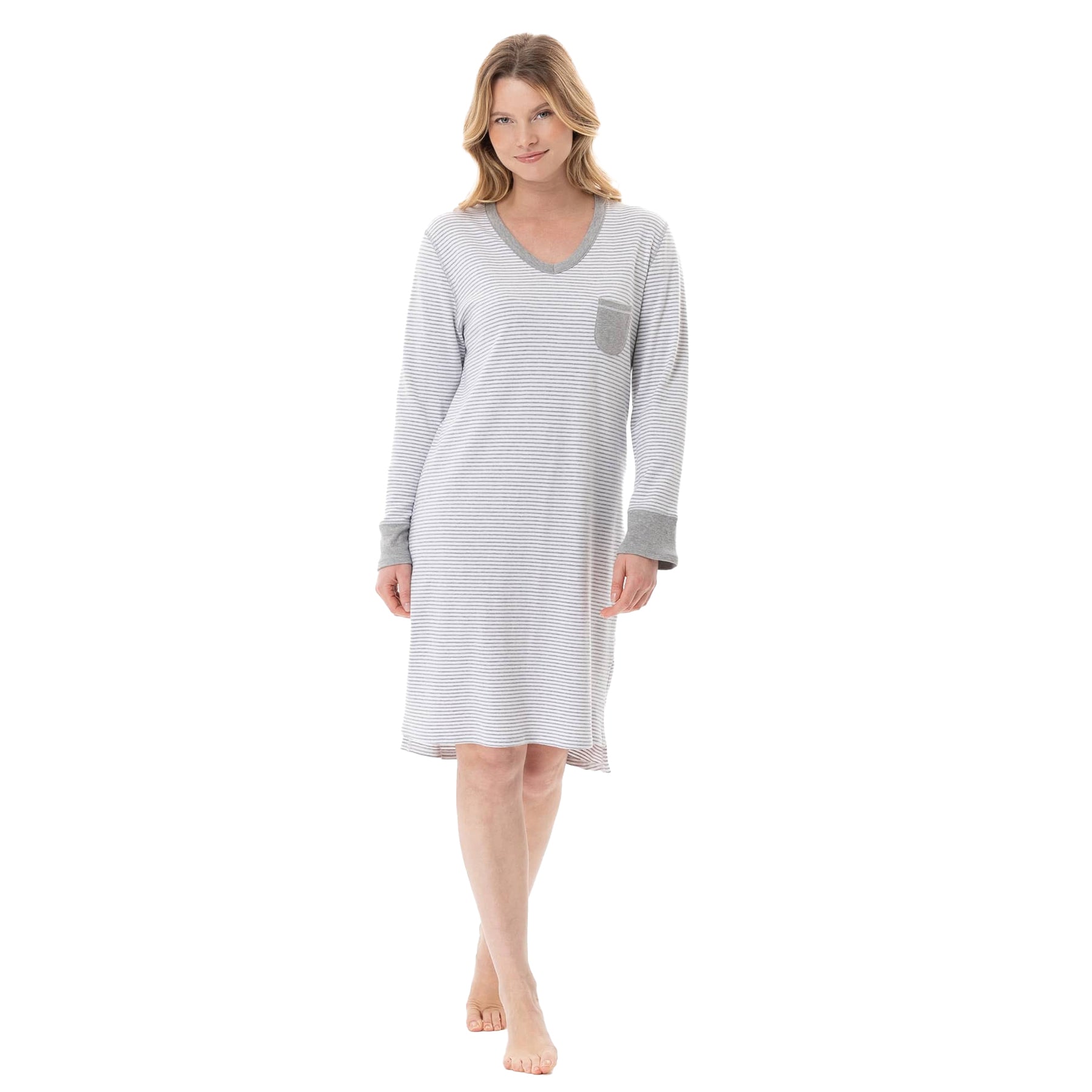 Woman wearing a gray and white striped nightshirt on a white background