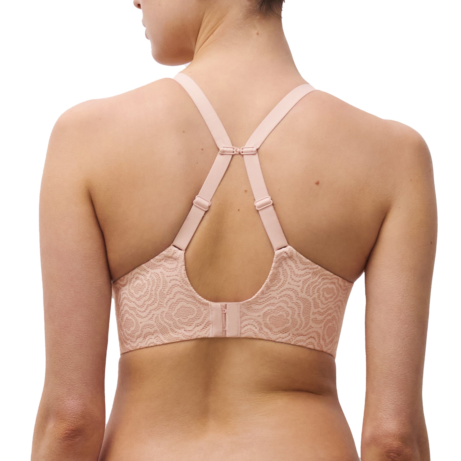 Back view of model wearing nude rose underwire bra with racerback strap option and lace band.