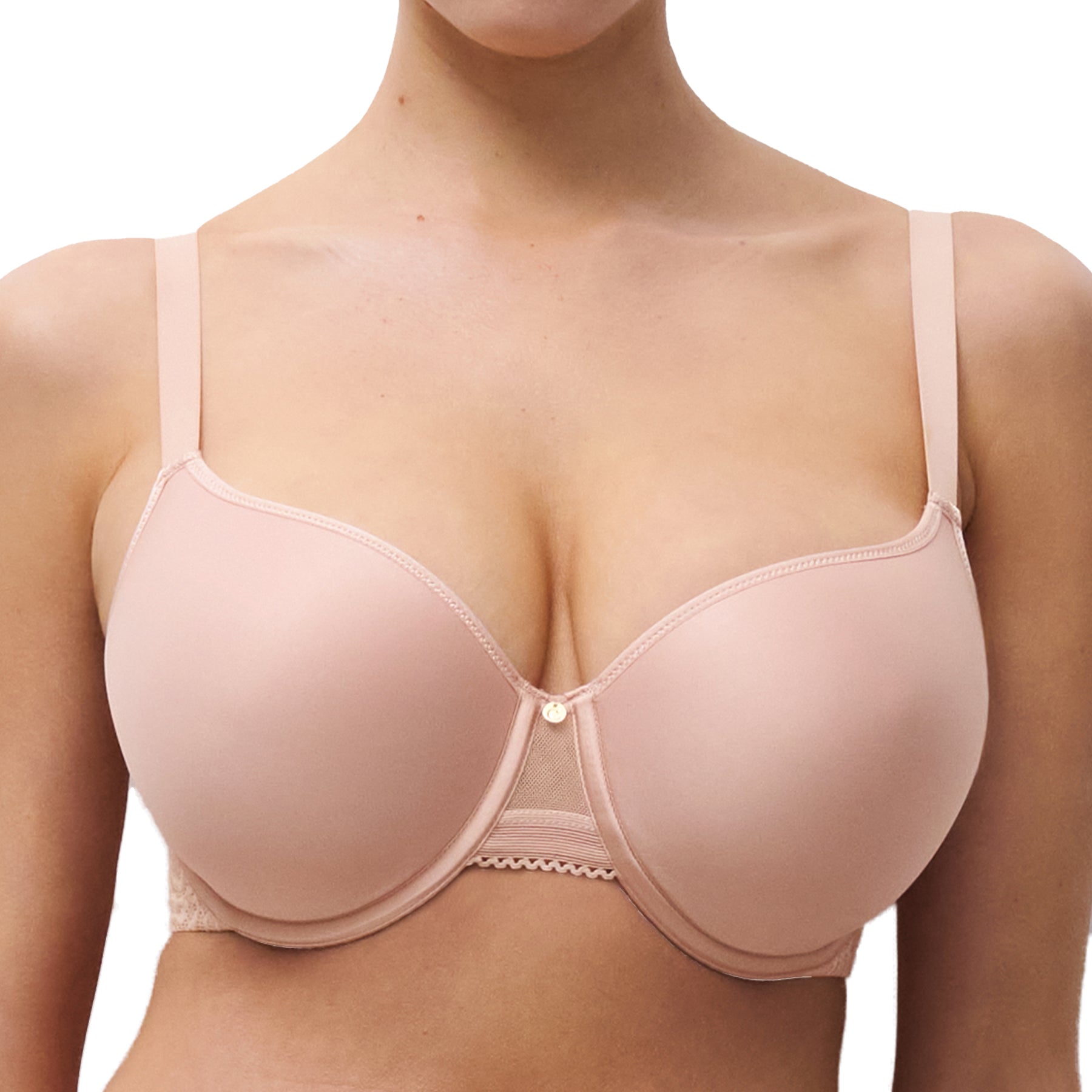 Close-up front view of nude rose underwire bra showing smooth cups, centre mesh detail, and small gold charm.