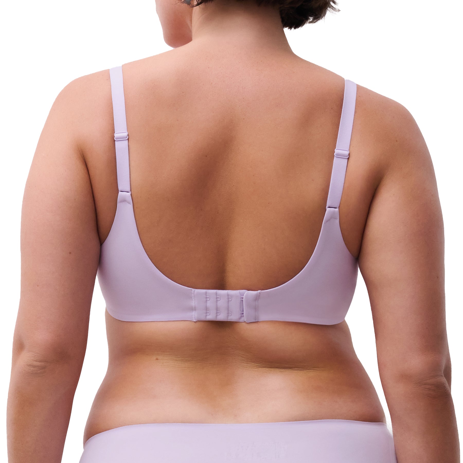 Back view of light mauve underwire bra showing smooth band, adjustable straps, and hook-and-eye closure.