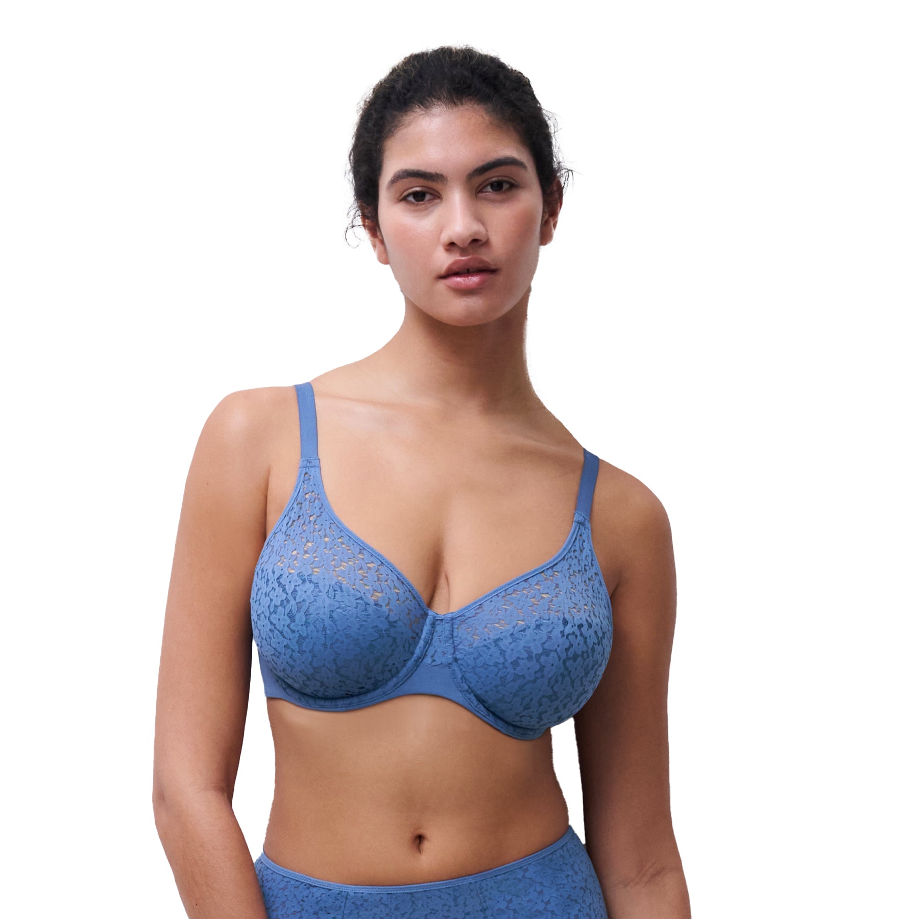 Model wearing an ocean blue floral lace underwire bra with sheer lace upper cups and matching coordinating briefs