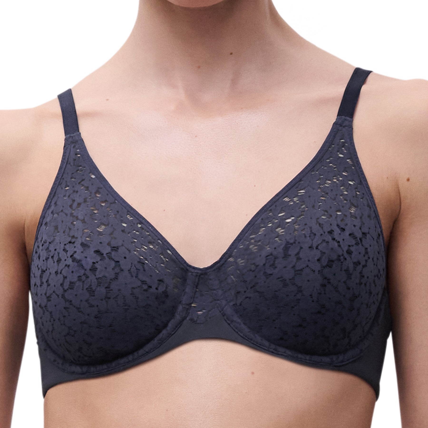 Close-up of navy lace full-cup bra highlighting sheer floral overlay and seamless finish.