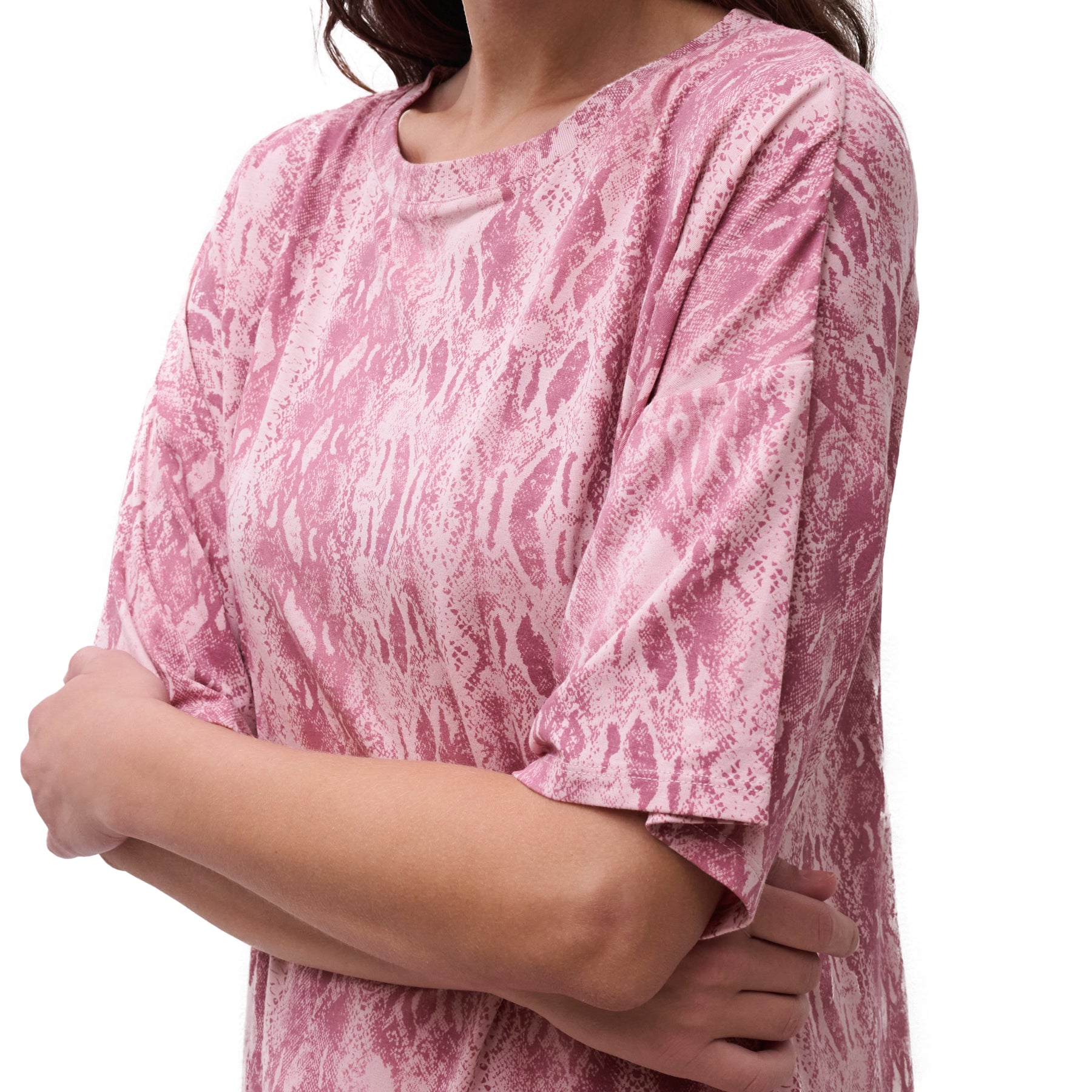 Close-up of pink snake-print sleep top showing soft fabric, round neckline, and short sleeves.