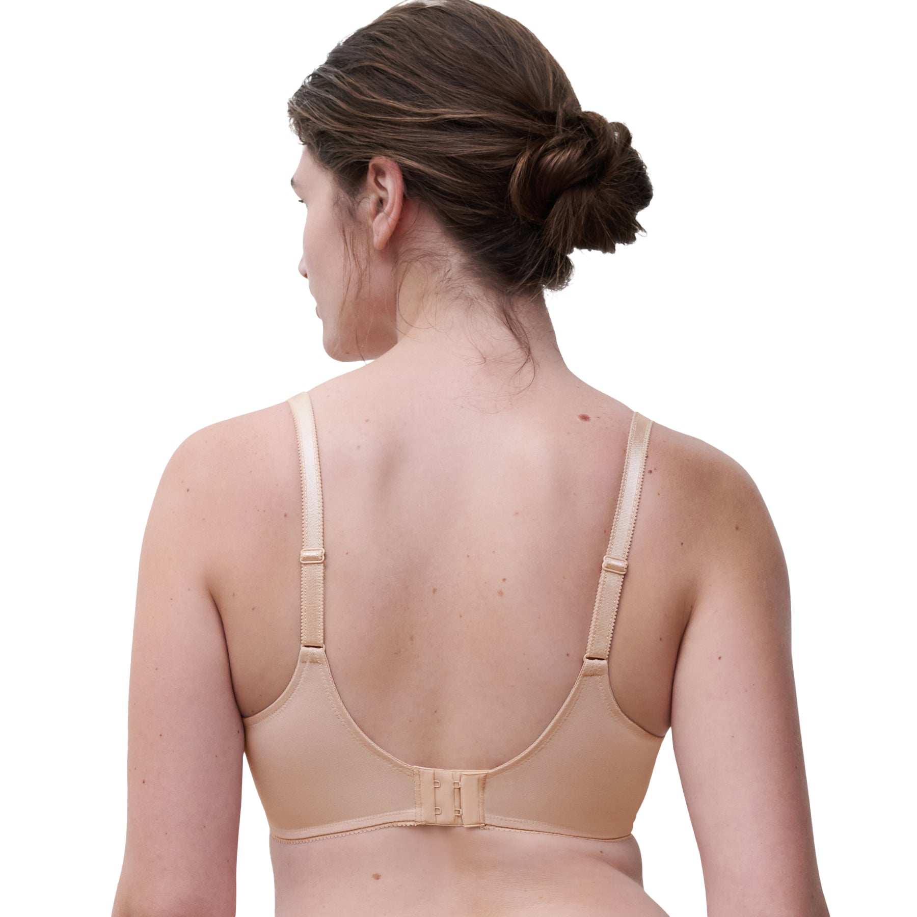 Back view of Chantelle lace full coverage bra in peau rosée, adjustable straps and hook closure.