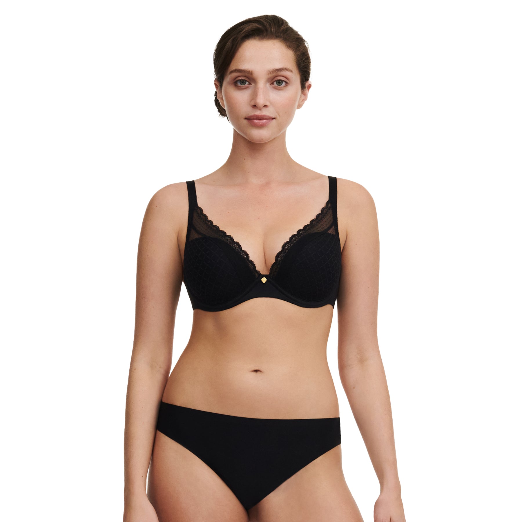 Front view of model wearing black plunge bra with lace trim and matching seamless black brief.