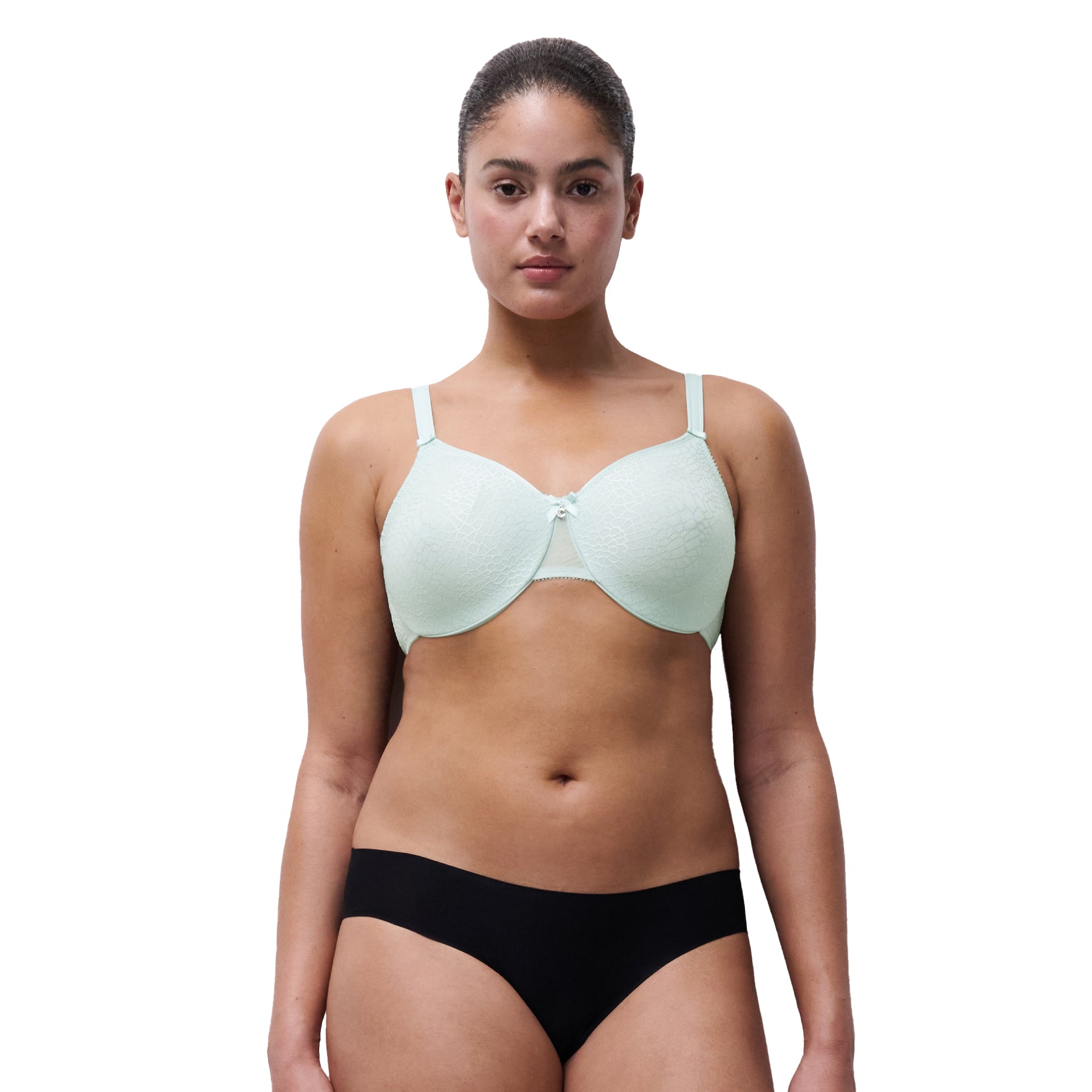 Model wearing atoll green lace underwire bra showcasing a smooth silhouette and soft pastel colour