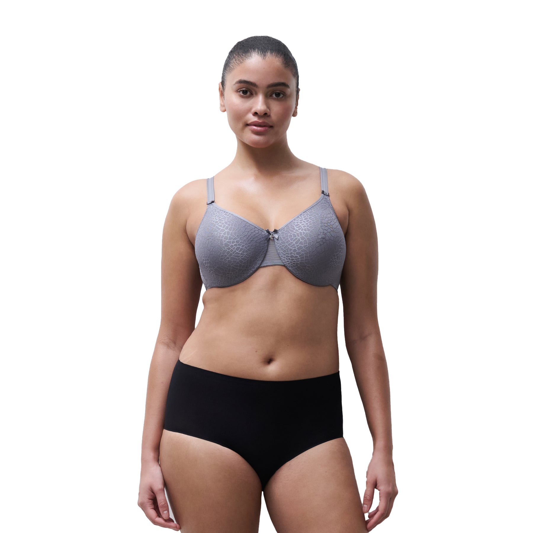 Full body view of model wearing Chantelle C Magnifique seamless minimizer bra in New Smoke Grey paired with black high-waist underwear.