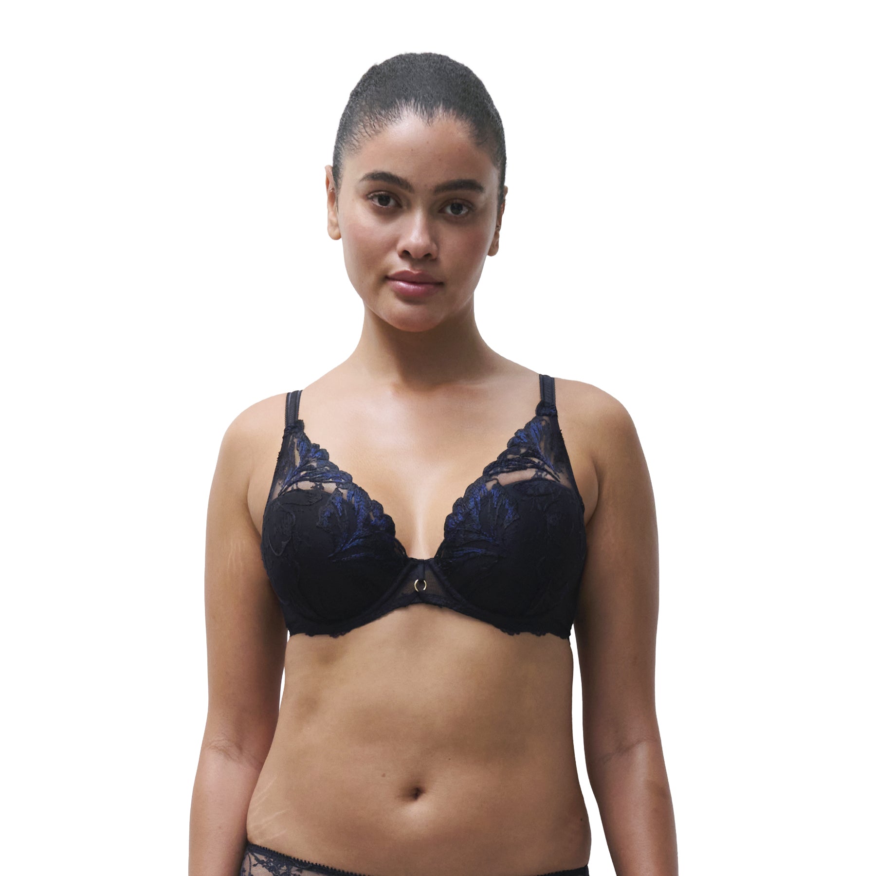 Model wearing a black and navy floral lace underwire bra with sheer embroidered detailing and gold-tone centre accent.