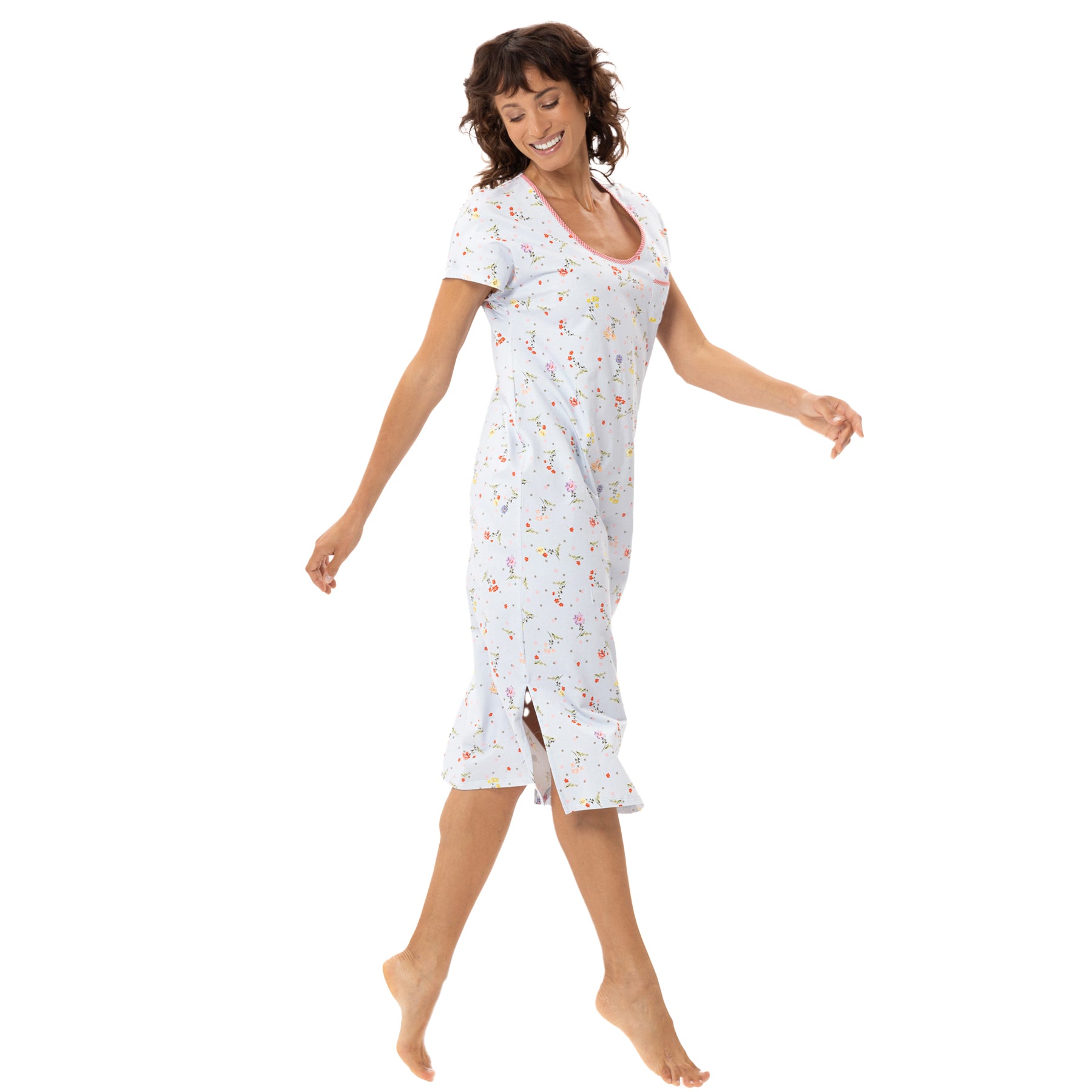 Woman wearing light blue floral print nightgown with short sleeves and side slit, soft drape fit, lifestyle walking pose