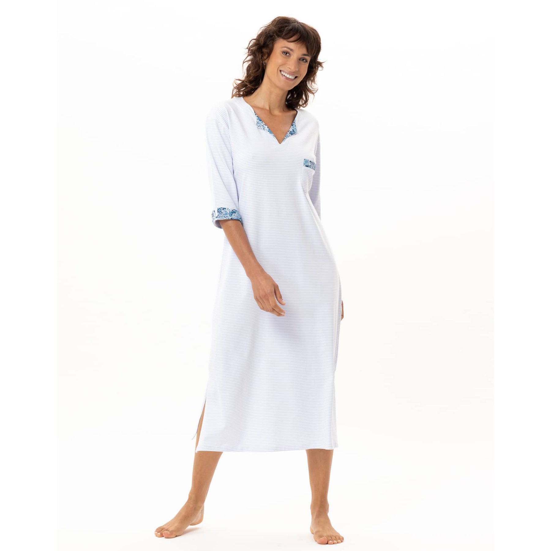 Women’s lightweight blue stripe nightdress with side slit and floral trim detail, front pose