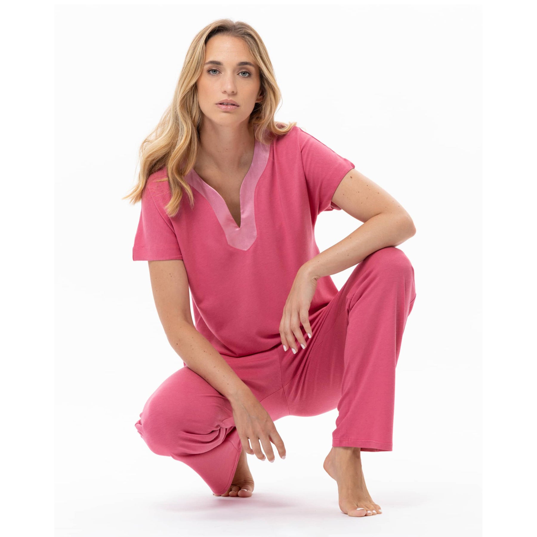 Close-up of pink pyjama top featuring soft satin V-neck trim – style C223APY.