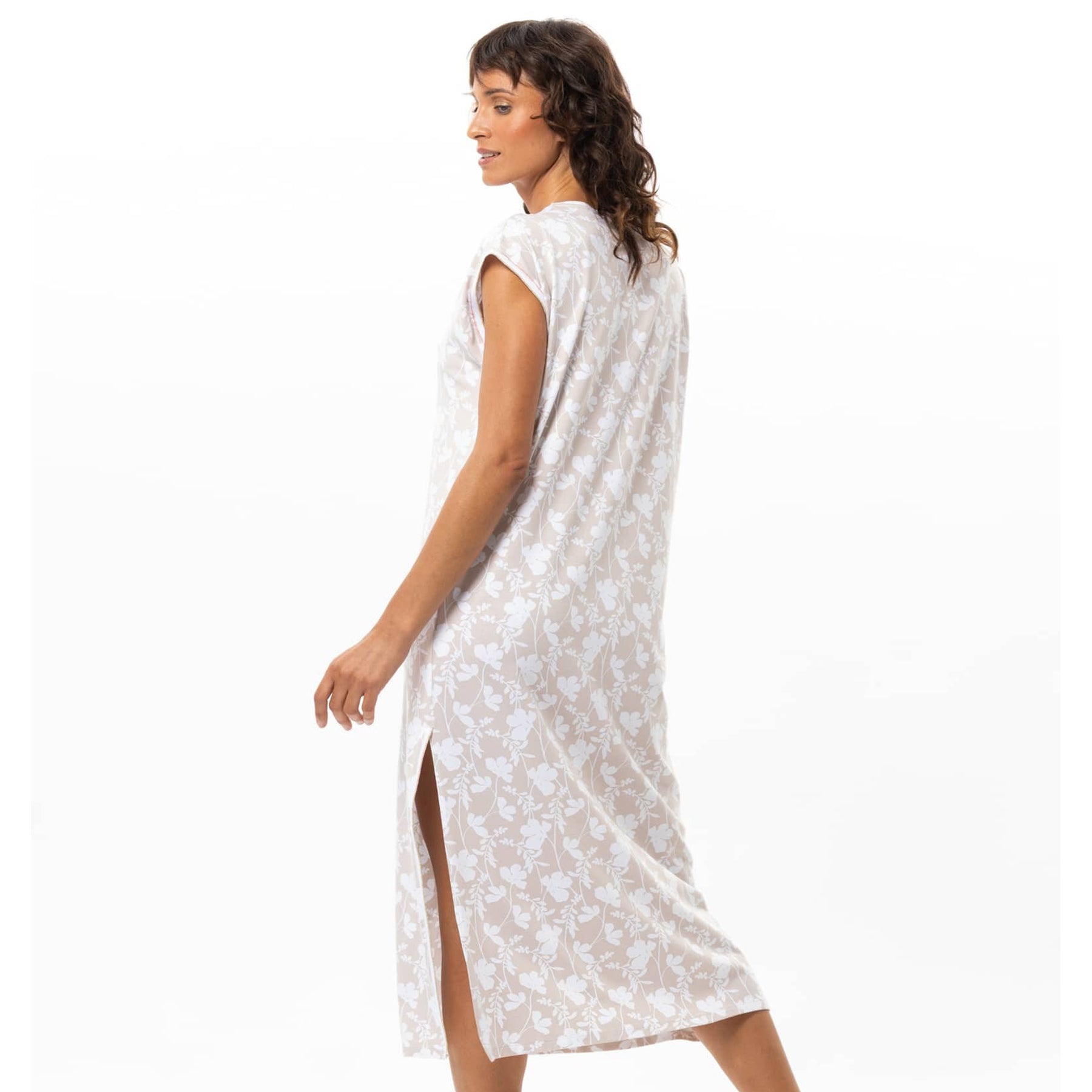 Back view of beige and white floral cotton sleep gown with side slit and cap sleeves