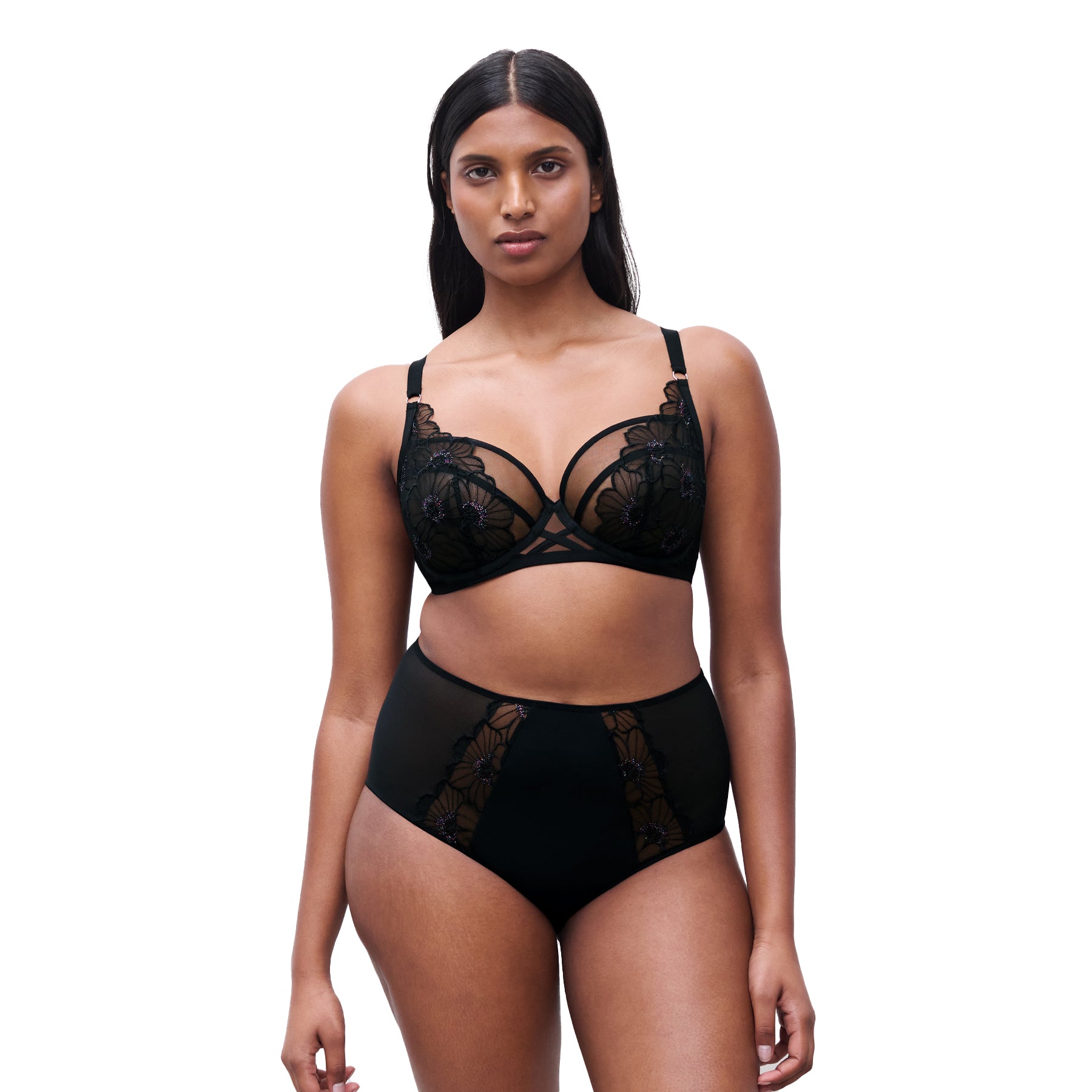 Full-body front view of model wearing black floral embroidered plunge bra and matching high-waist sheer panel brief.