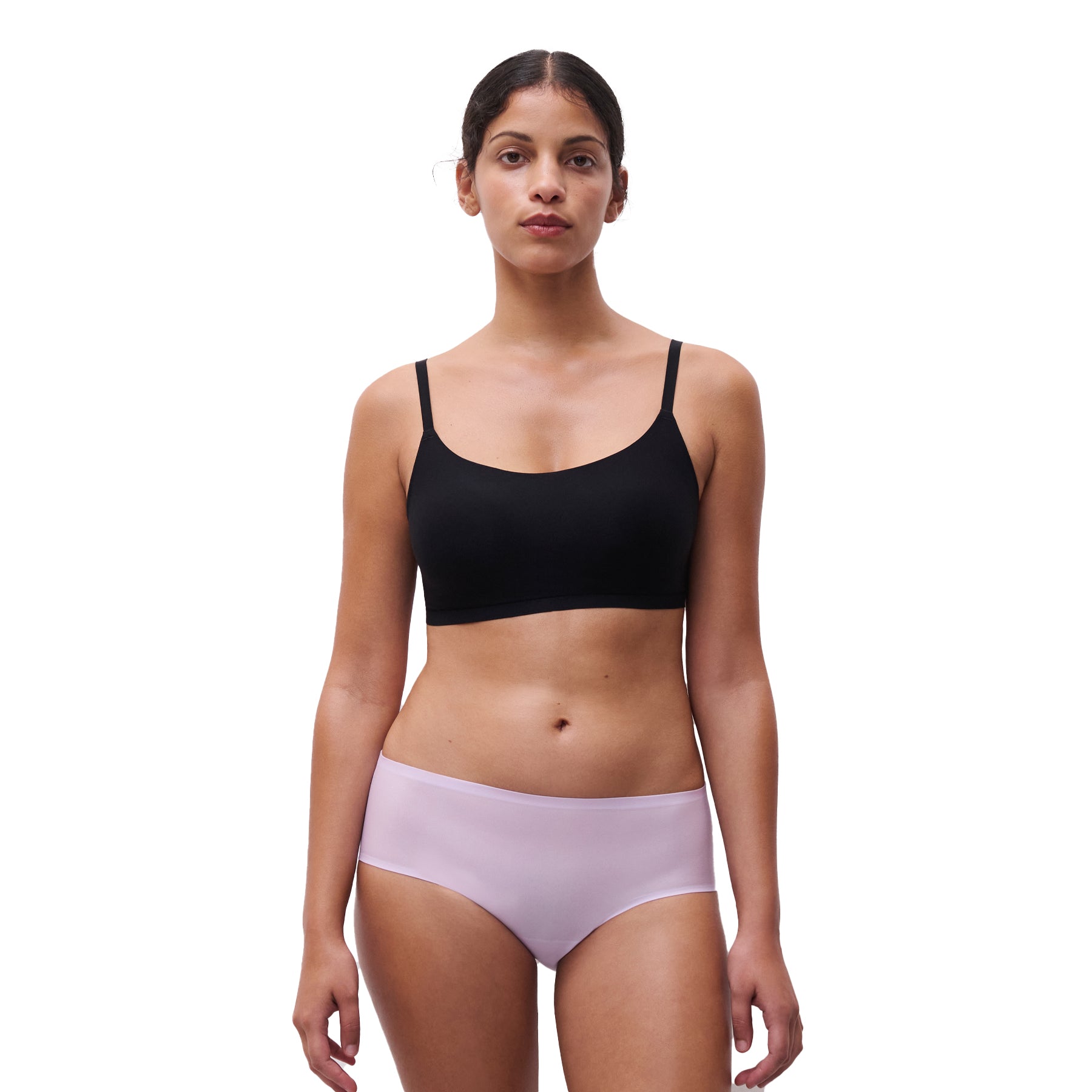 A model wearing a lavender Shorty in purple colour from Chantelle on the white background, front view.