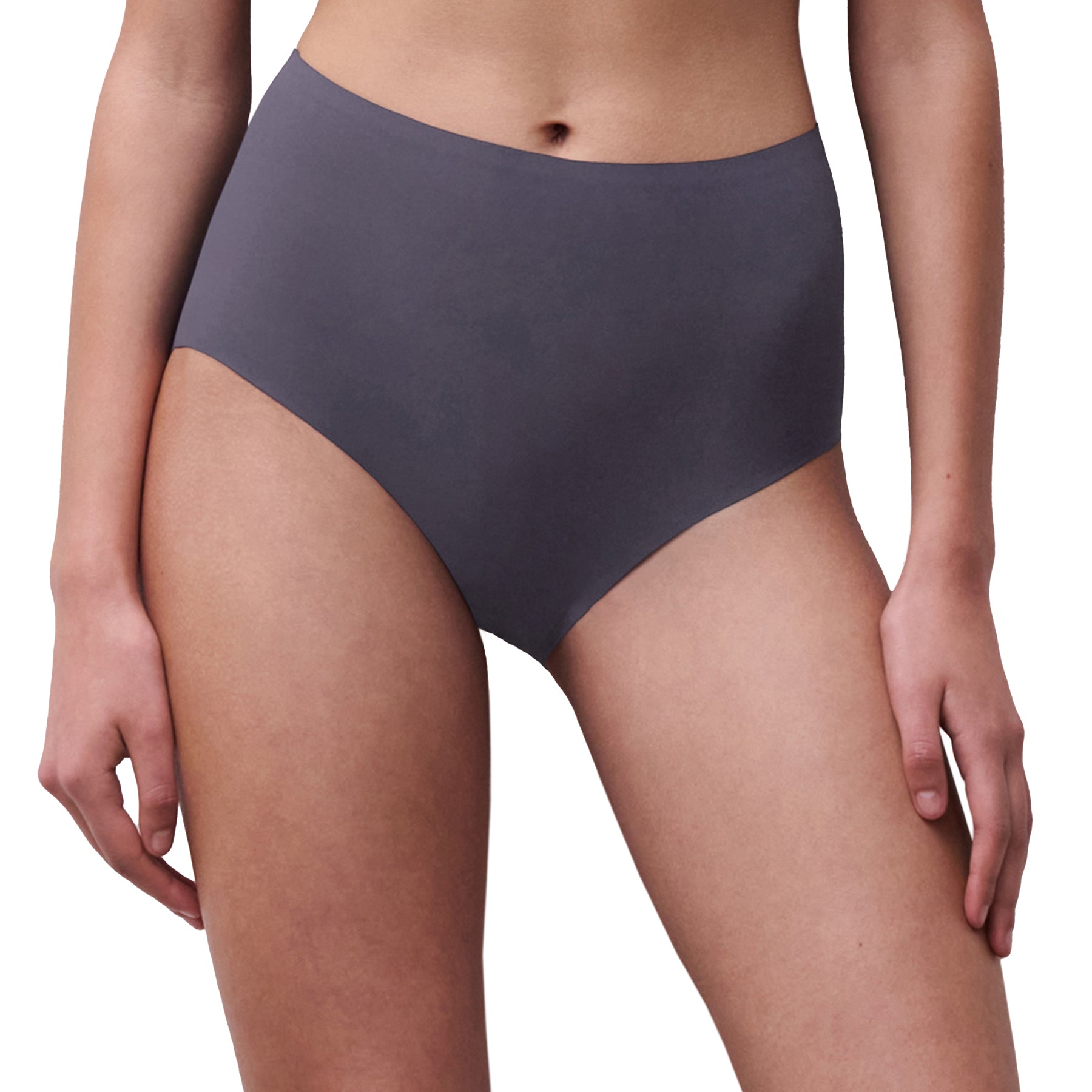 Person wearing dark gray high-waisted underwear on a white background