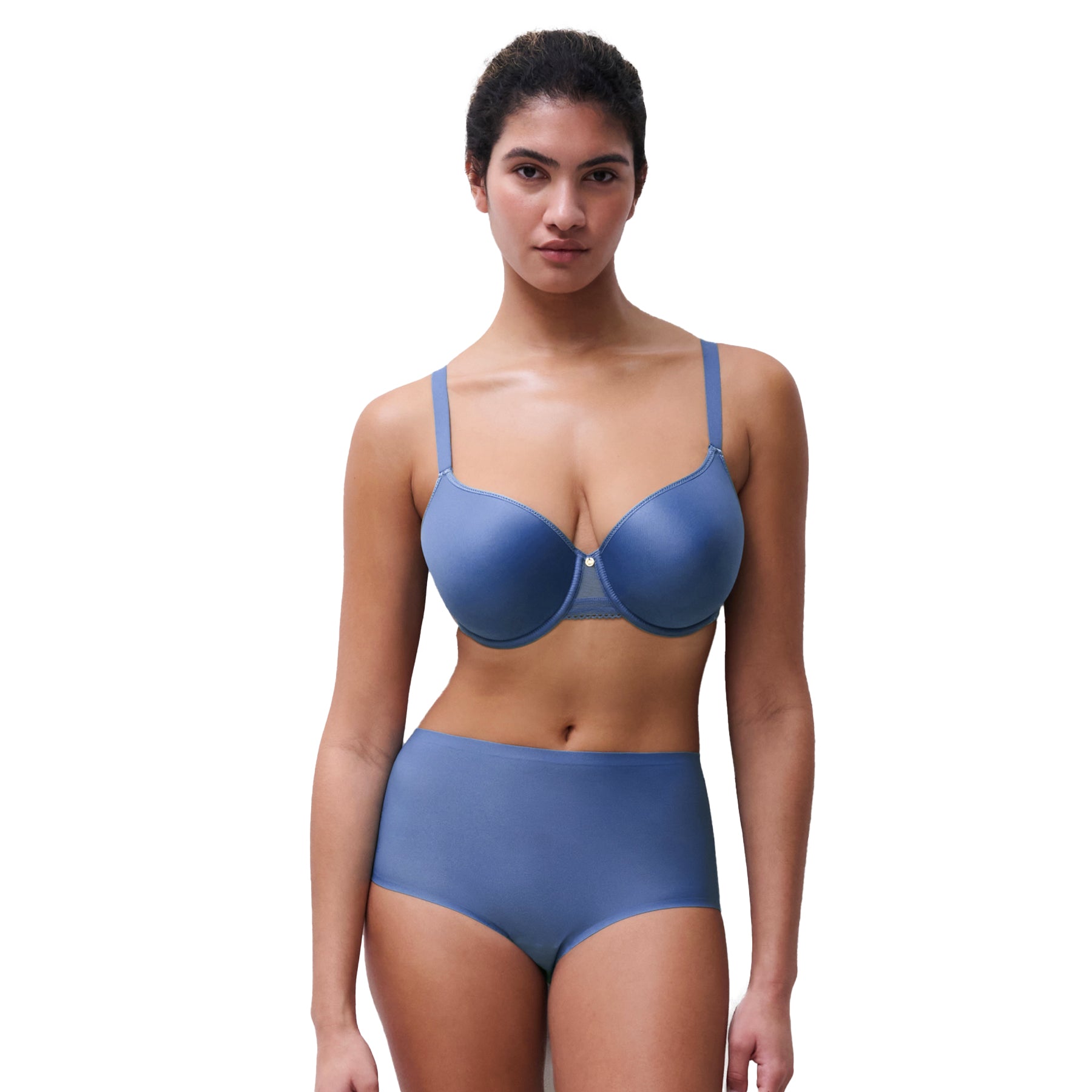 Model wearing ocean blue seamless high-waist underwear with a smooth T-shirt bra for an everyday invisible look
