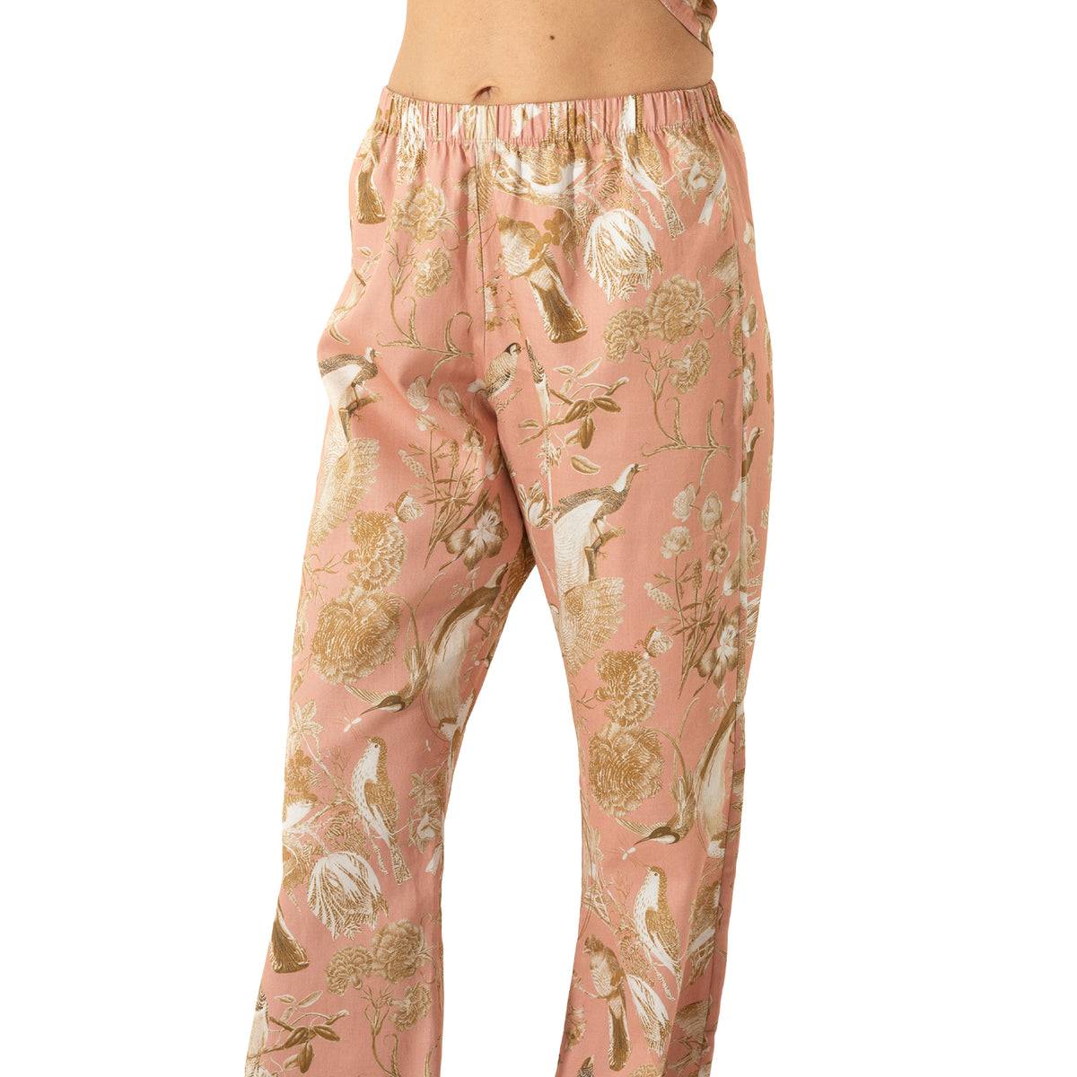 Dusty pink pajama pants featuring an elegant bird and botanical print with a comfortable elastic waistband and relaxed straight-leg fit.