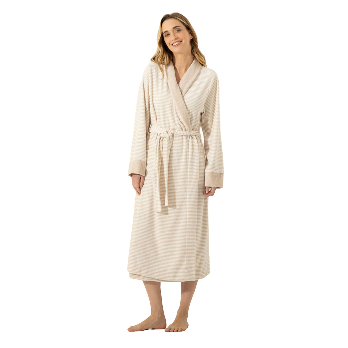 Woman wearing a long beige and cream striped robe with a wrap front, waist tie, contrast shawl collar, and long sleeves.