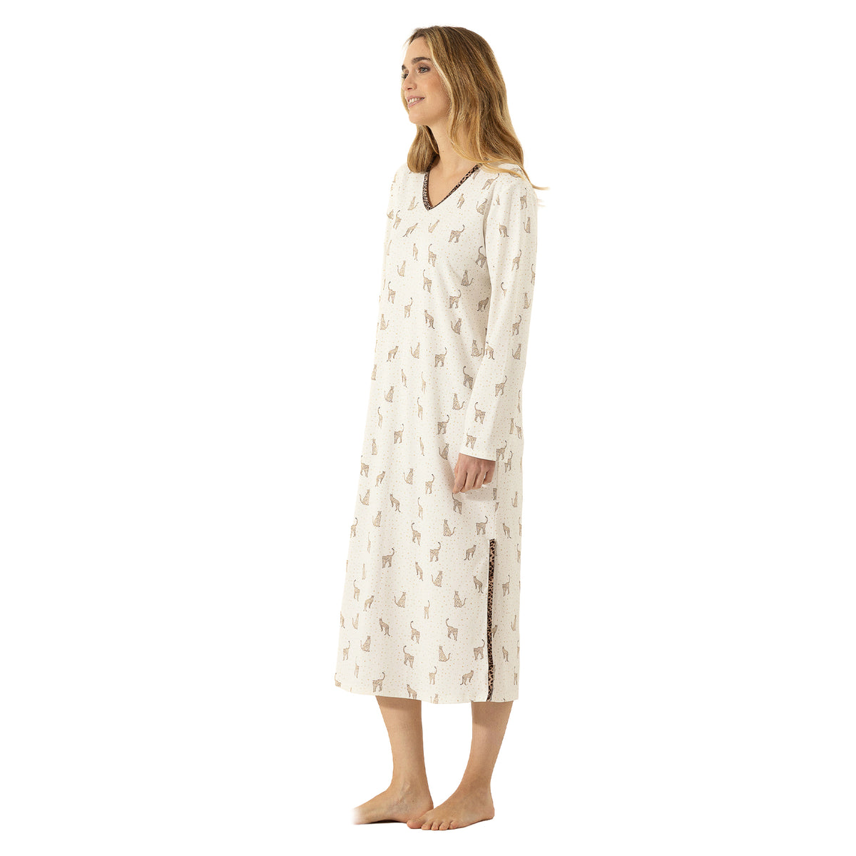 Side view of ivory leopard-print nightgown with long sleeves and side slit accented with contrasting animal-print trim.