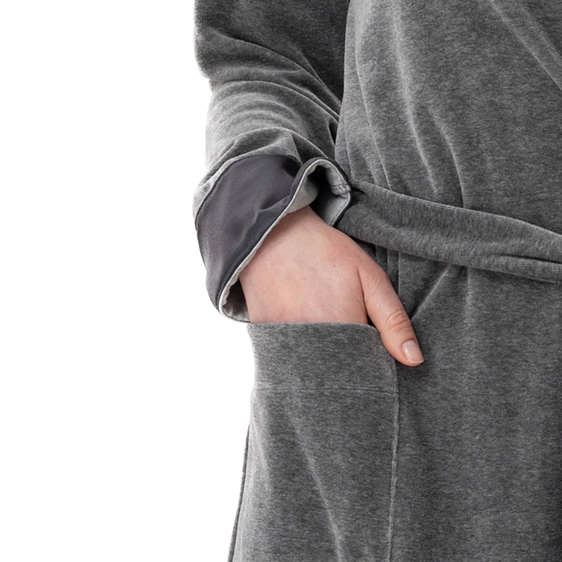 Close-up of robe pocket and satin-trimmed sleeve showing soft velour texture.