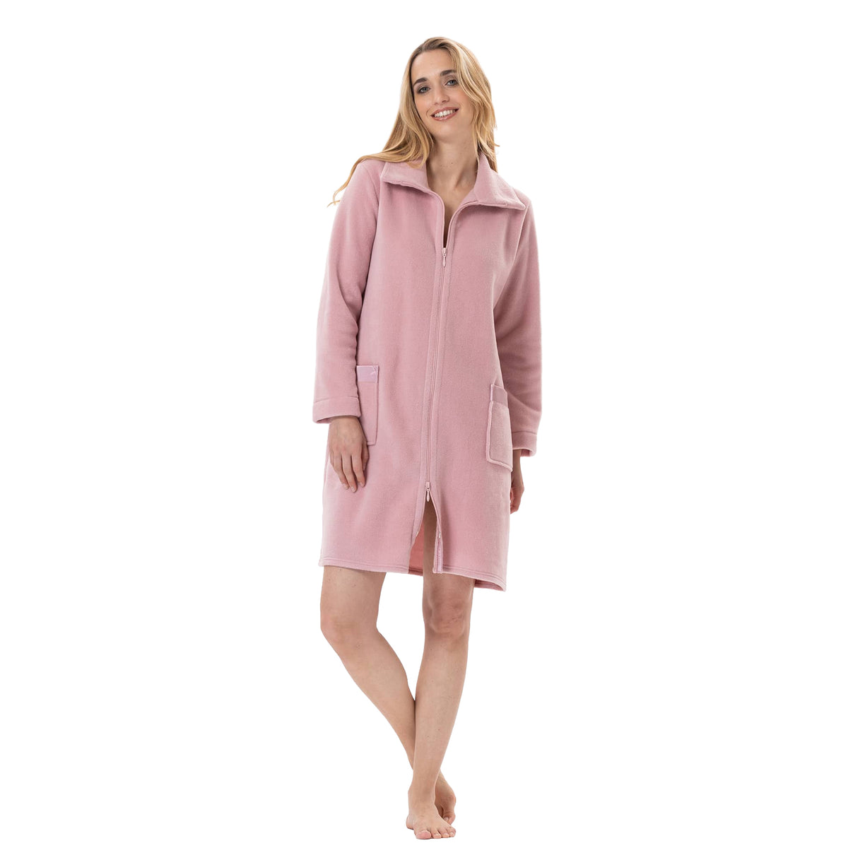Woman wearing a soft blush pink knee-length zip-up robe with a wide collar, long sleeves, and front patch pockets.