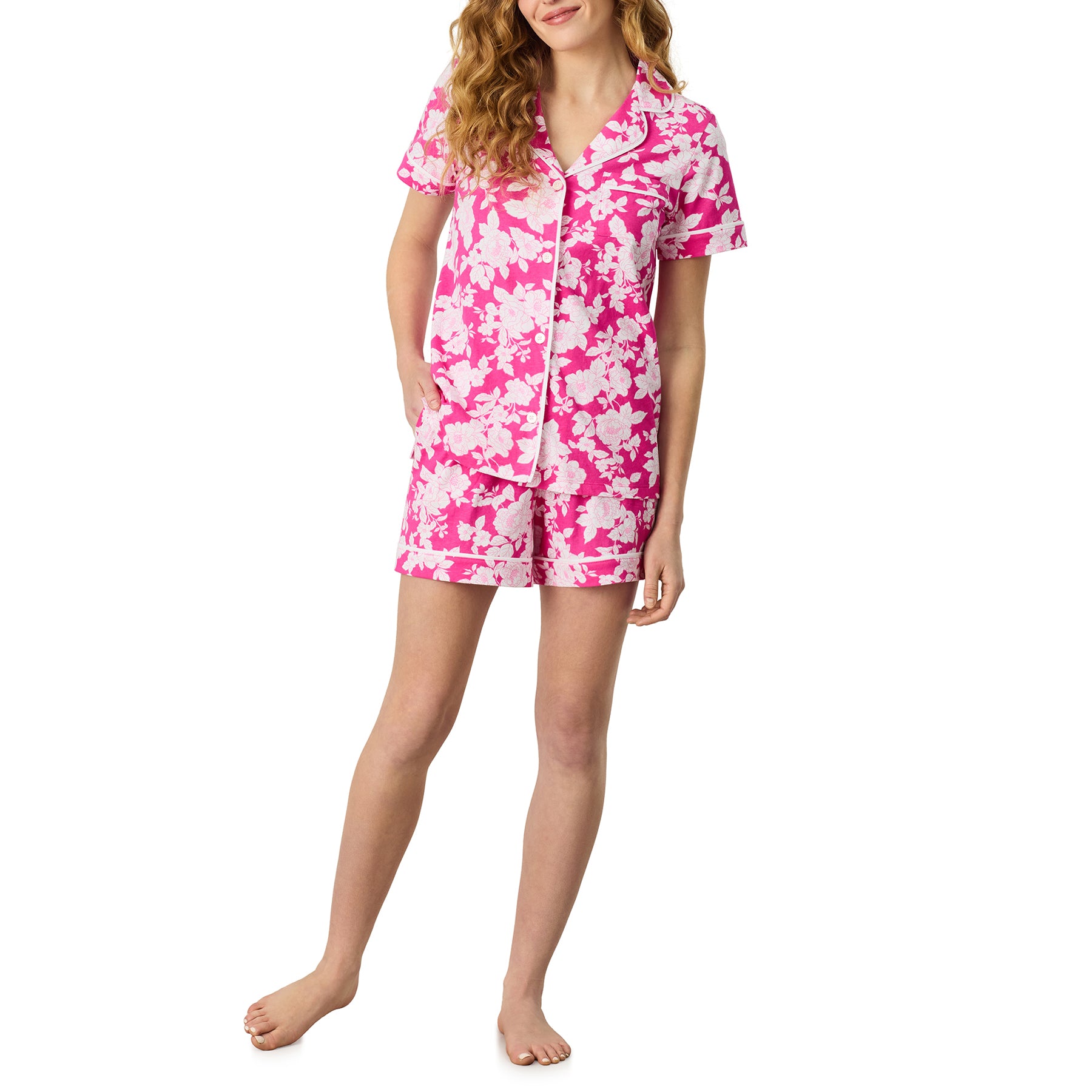 Front view of raspberry pink floral sleepwear set with short sleeve top and relaxed fit shorts in soft cotton