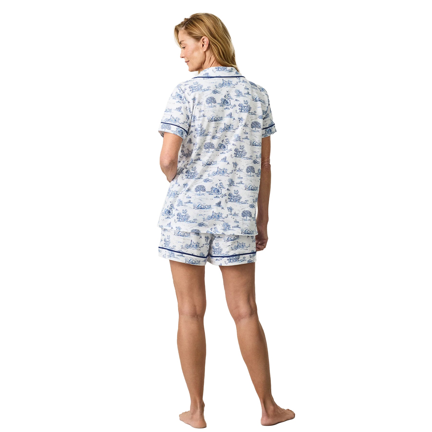 White toile countryside print short pyjama set with short sleeve button-down top and matching shorts, back view.