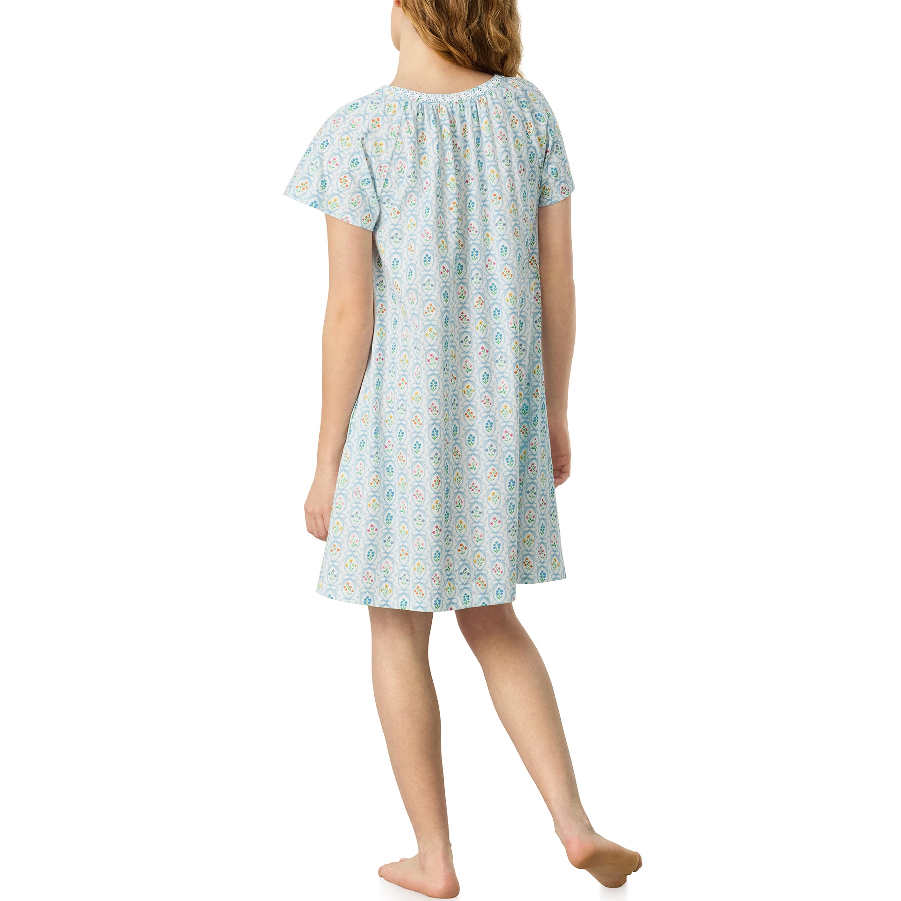Back view of Carole Hochman ivory short sleeve nightgown with allover blue floral pattern