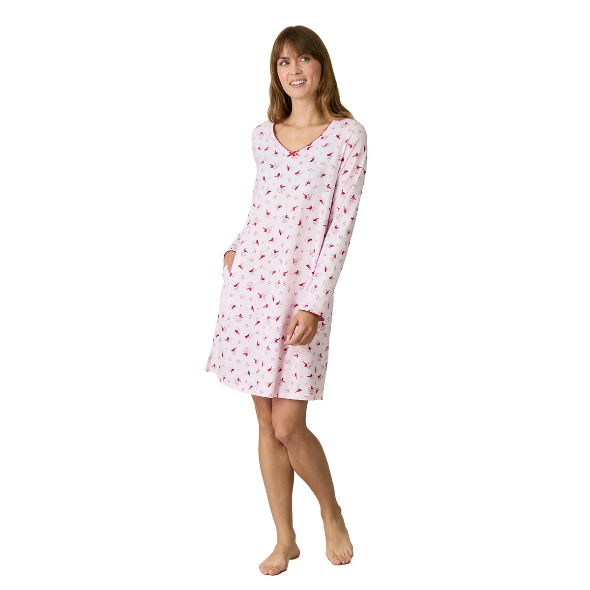 Angled view of a Carole Hochman pink cardinal-print chemise with long sleeves, red-trimmed V-neckline, relaxed fit and above-the-knee length.