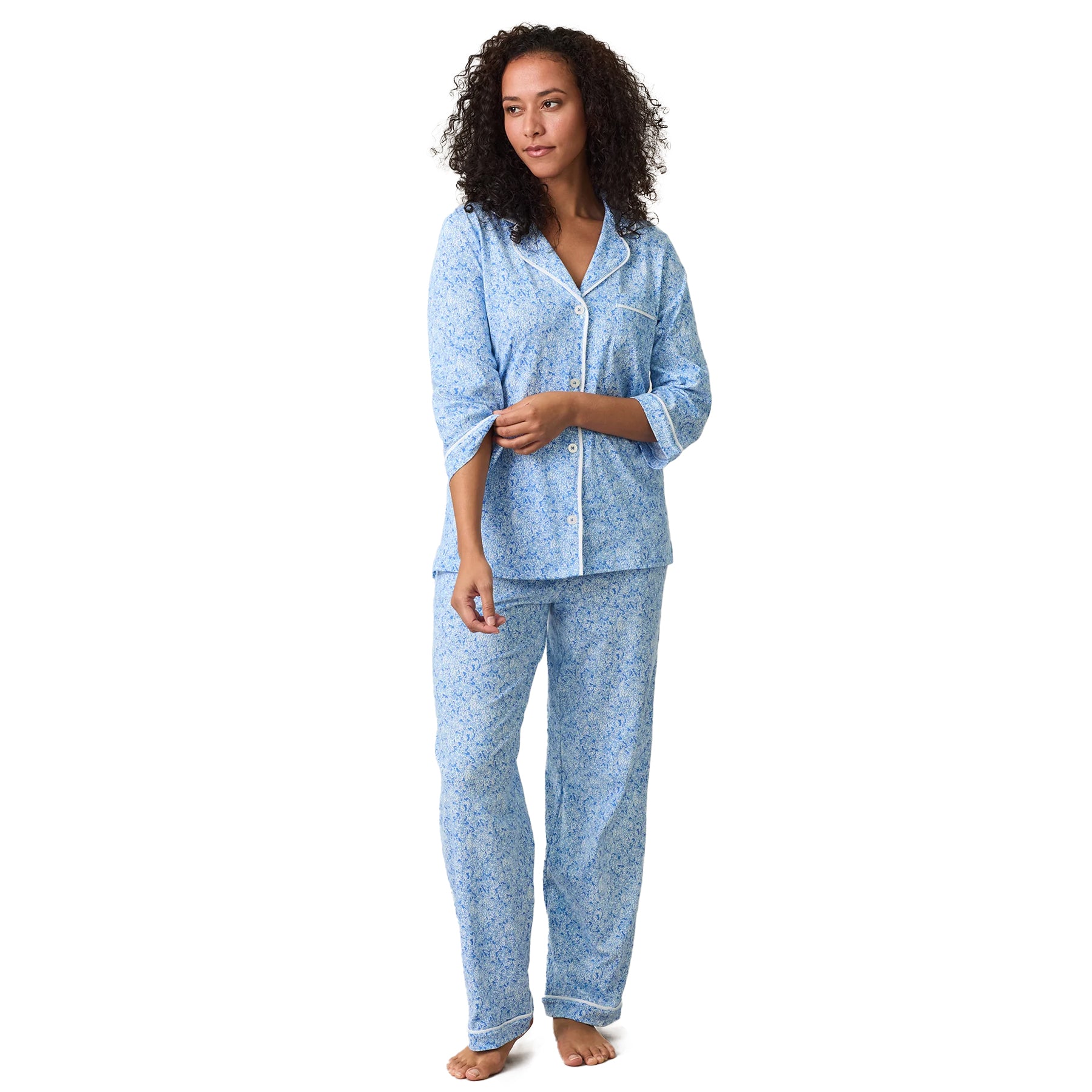 Women’s blue floral pyjama set with long sleeve button-down top, chest pocket and coordinating pants.