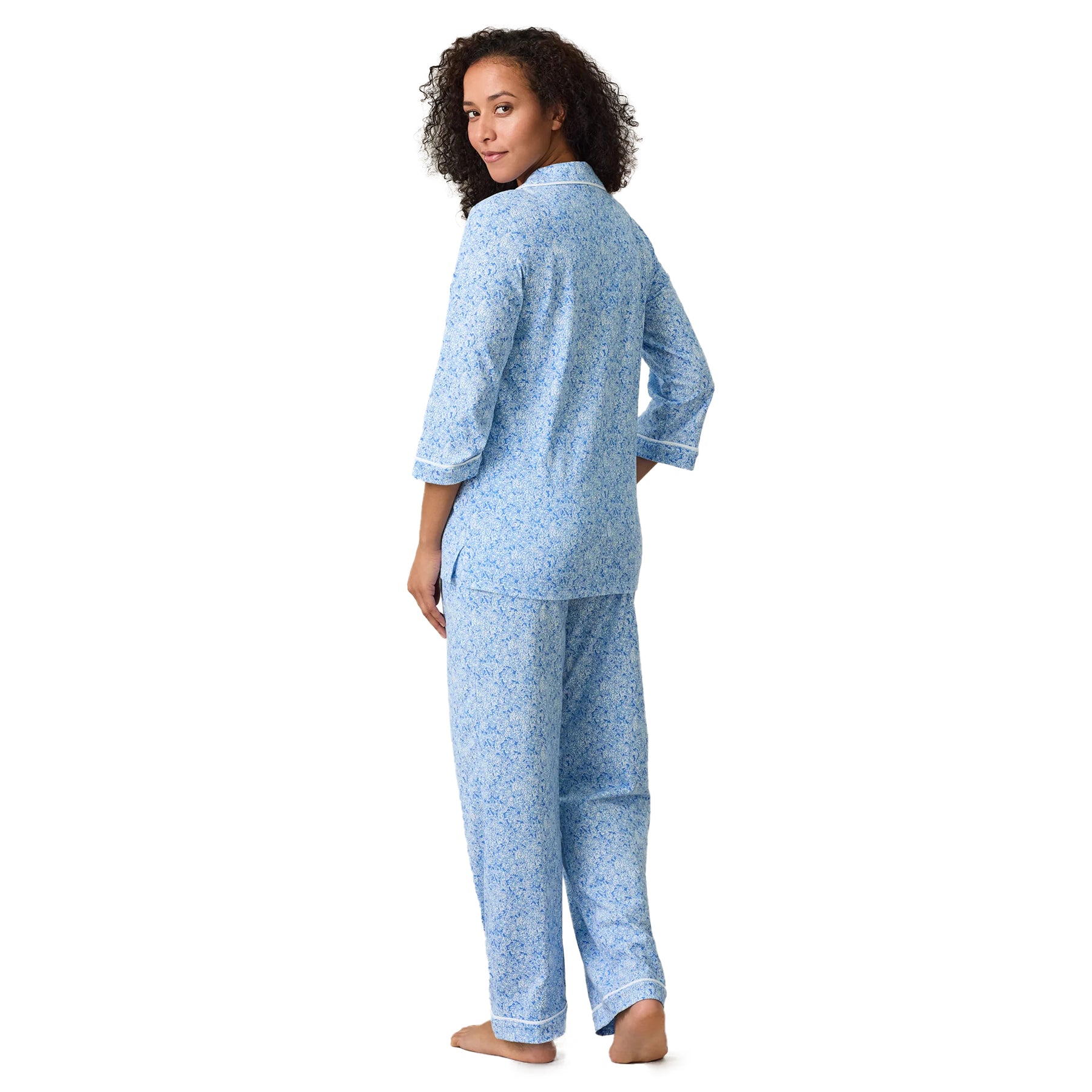 Blue floral long sleeve pyjama set with relaxed fit shirt and matching pants, back view.