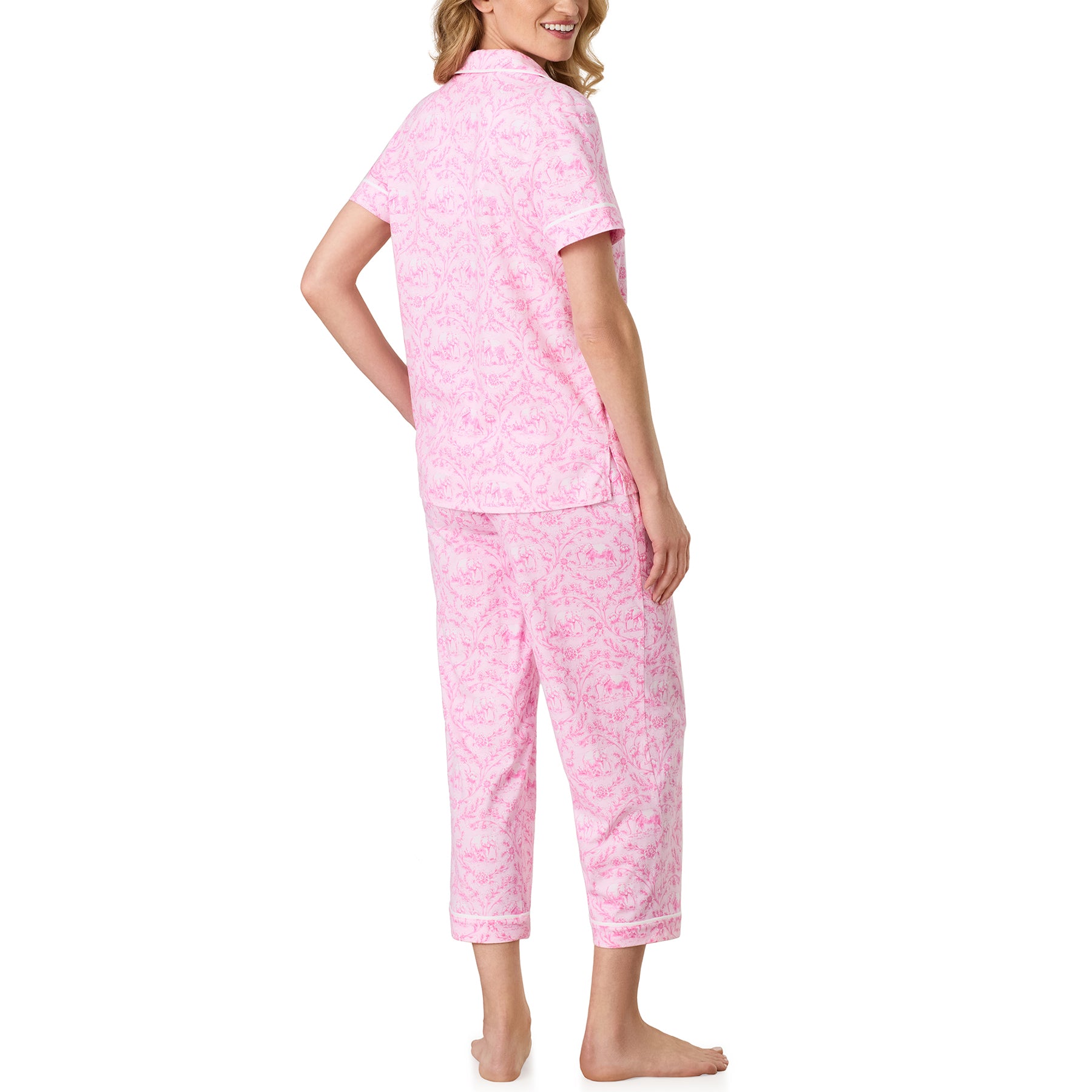 Back view of the Carole Hochman pajama set featuring a relaxed fit, classic short sleeves, and matching cropped pants in a charming pink floral elephant print.