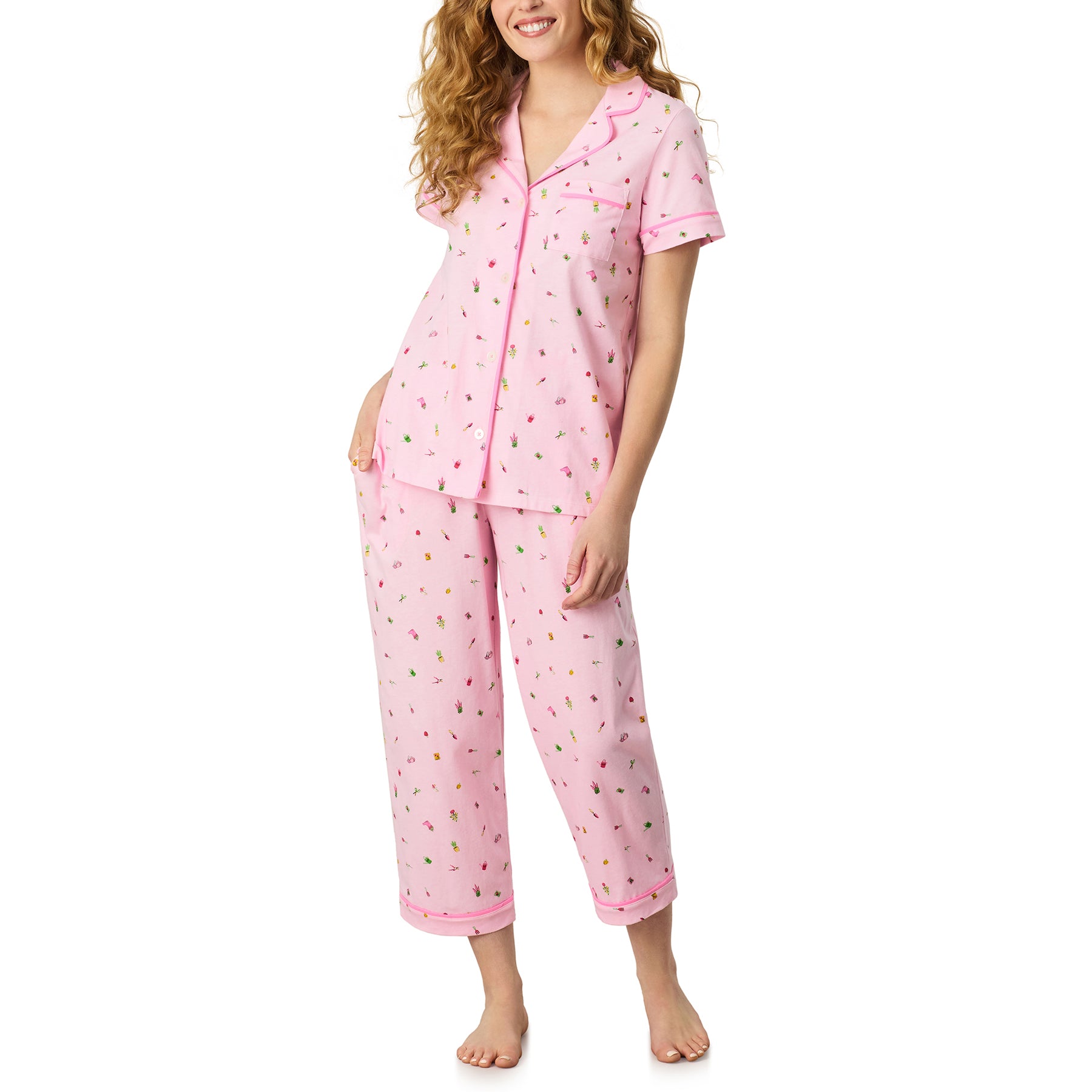 Carole Hochman pink cotton pyjama set with small gardening print, short sleeve button-front top and cropped pants, front view