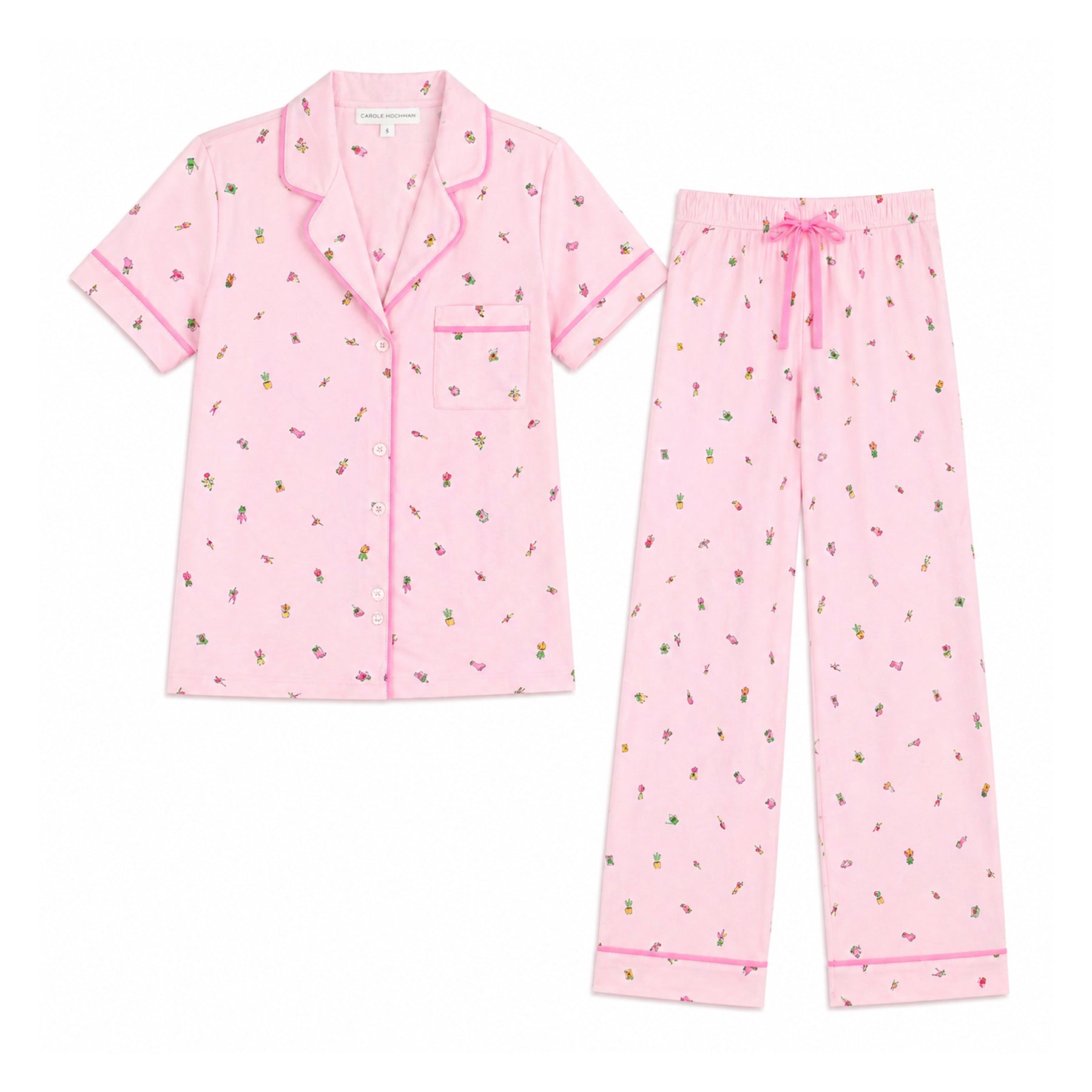 Flat lay of Carole Hochman pink gardening print pyjama set with button-front top and full-length pants on white background