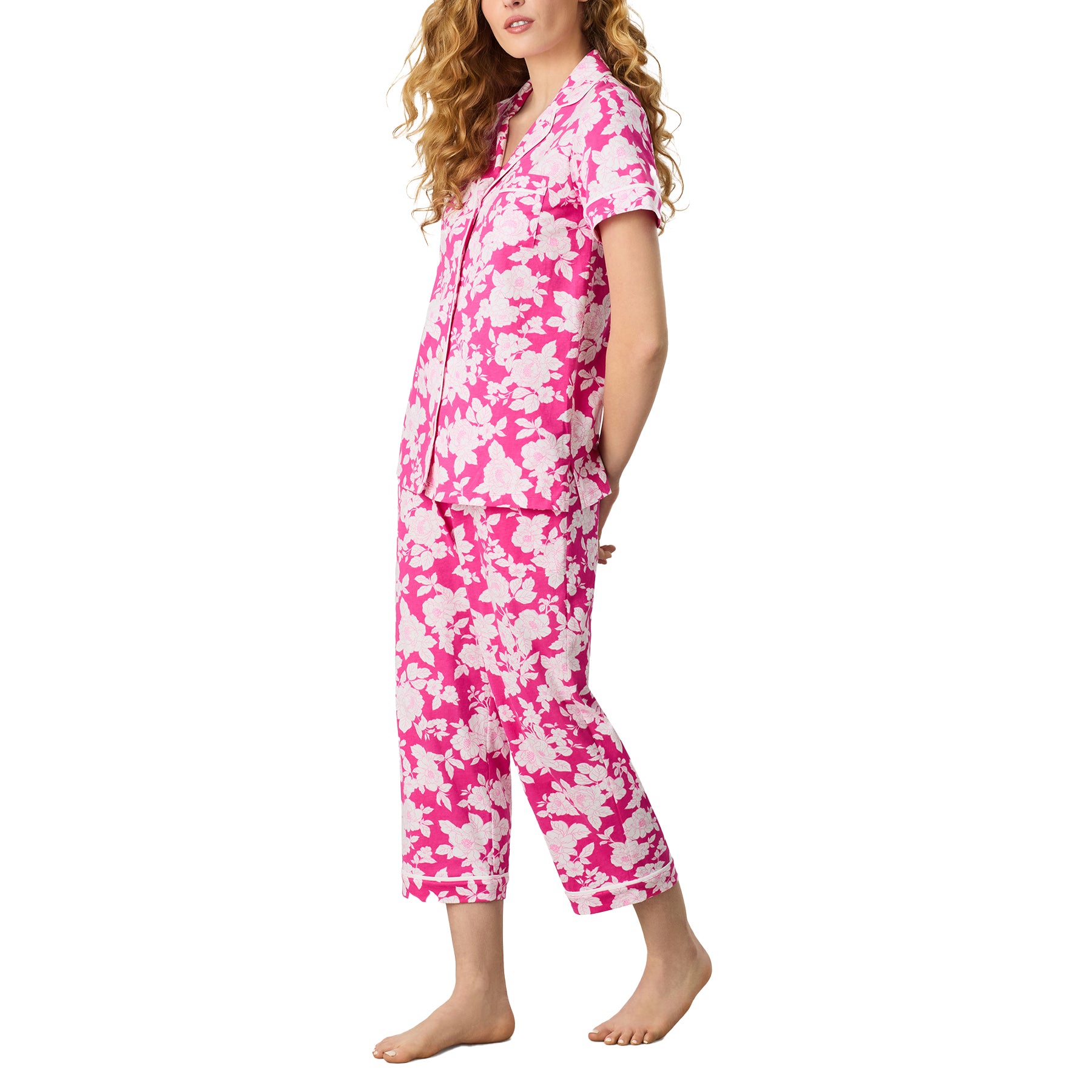 Side view of Carole Hochman floral pyjama set in pink and white, soft cotton fabric with relaxed fit pants