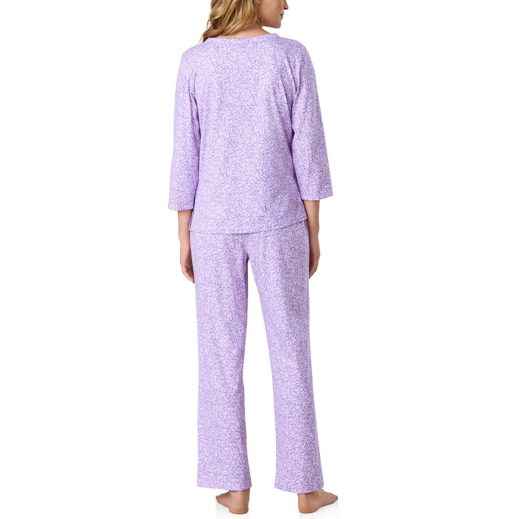 Back view of the Carole Hochman long sleeve pajama set featuring a relaxed-fit top and matching full-length pants in a delicate lavender floral print.
