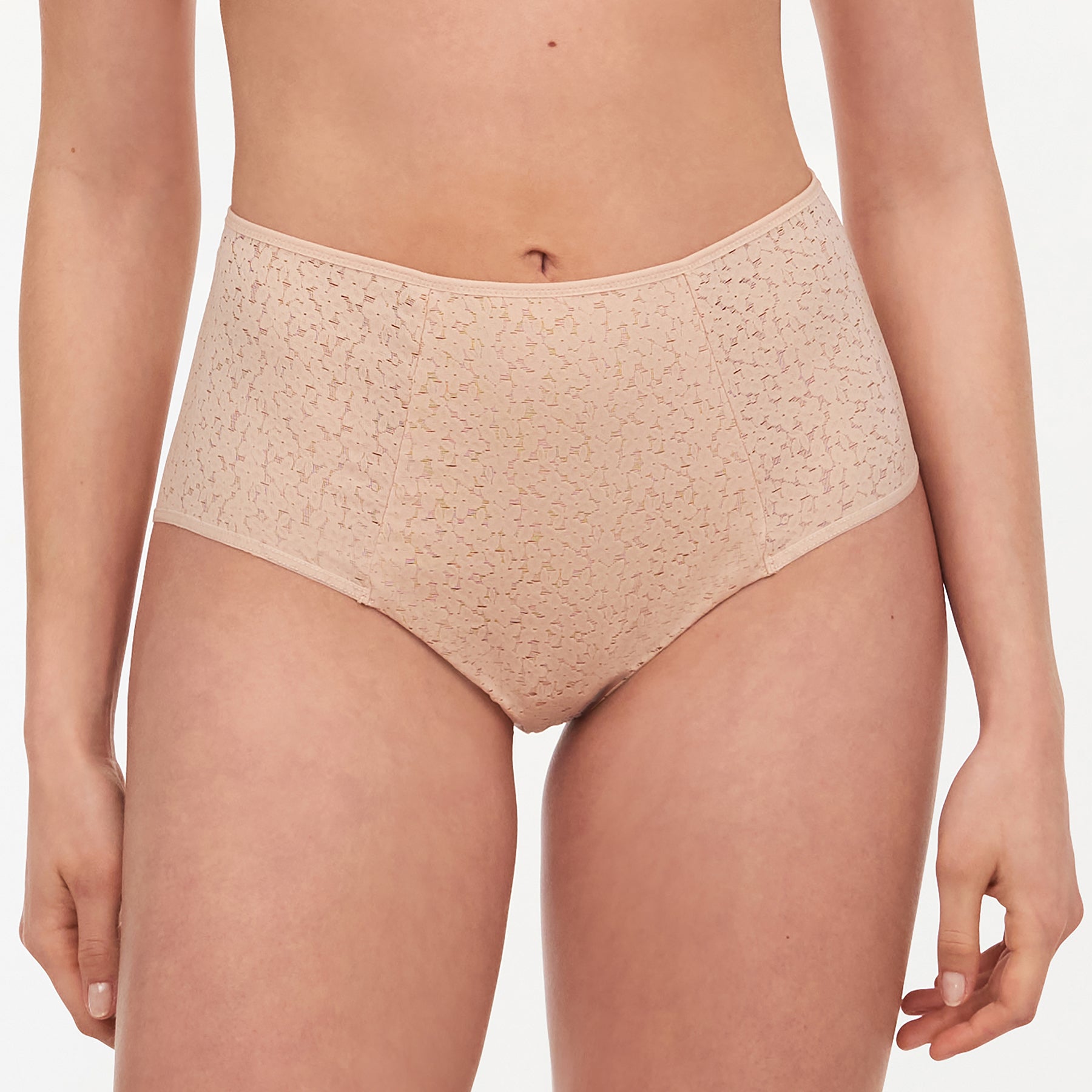 Chantelle light control Norah full brief with floral lace in nude golden beige. Front view on model.