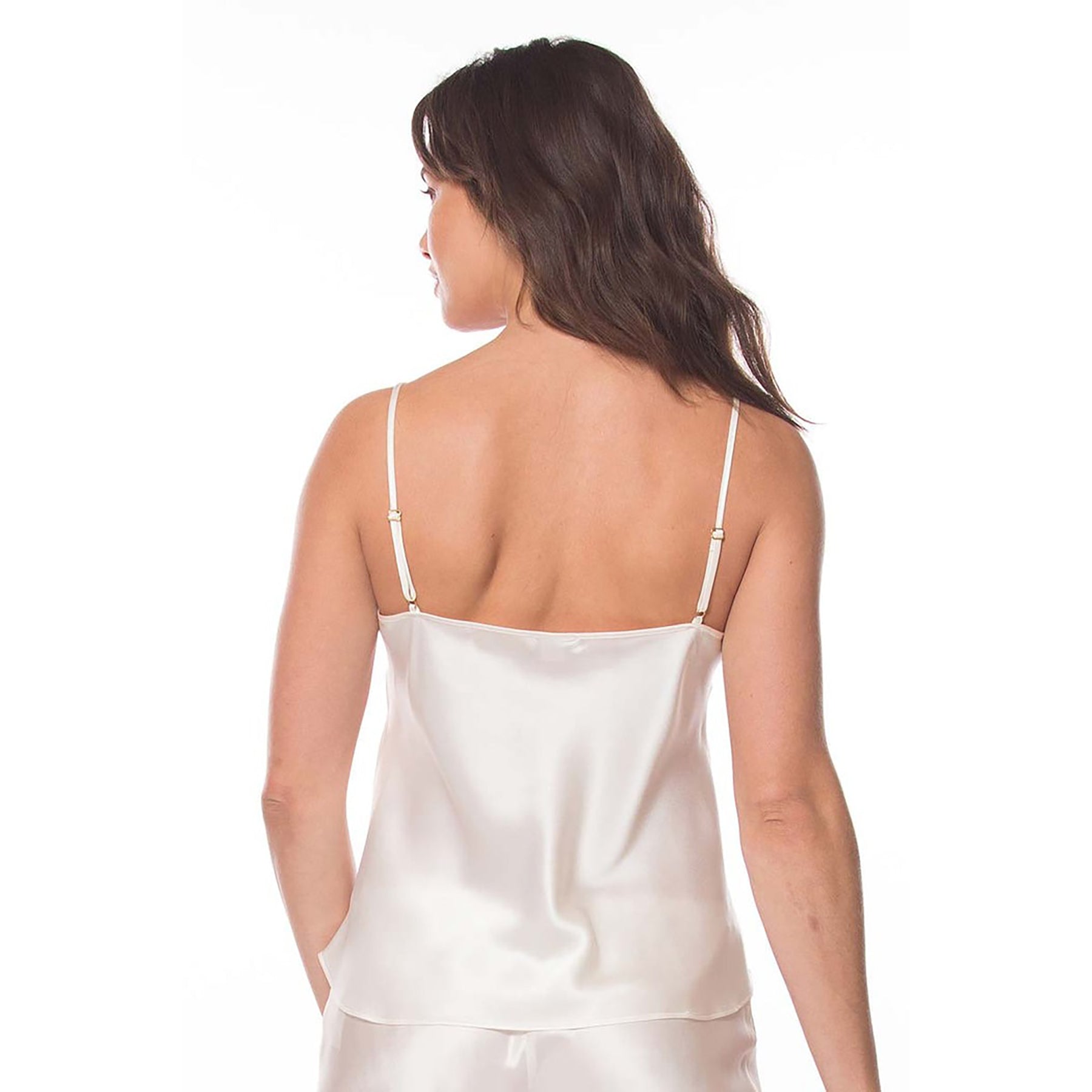 Silk spaghetti strap camisole with lace vneck in pearl ivory. Rear view on model.