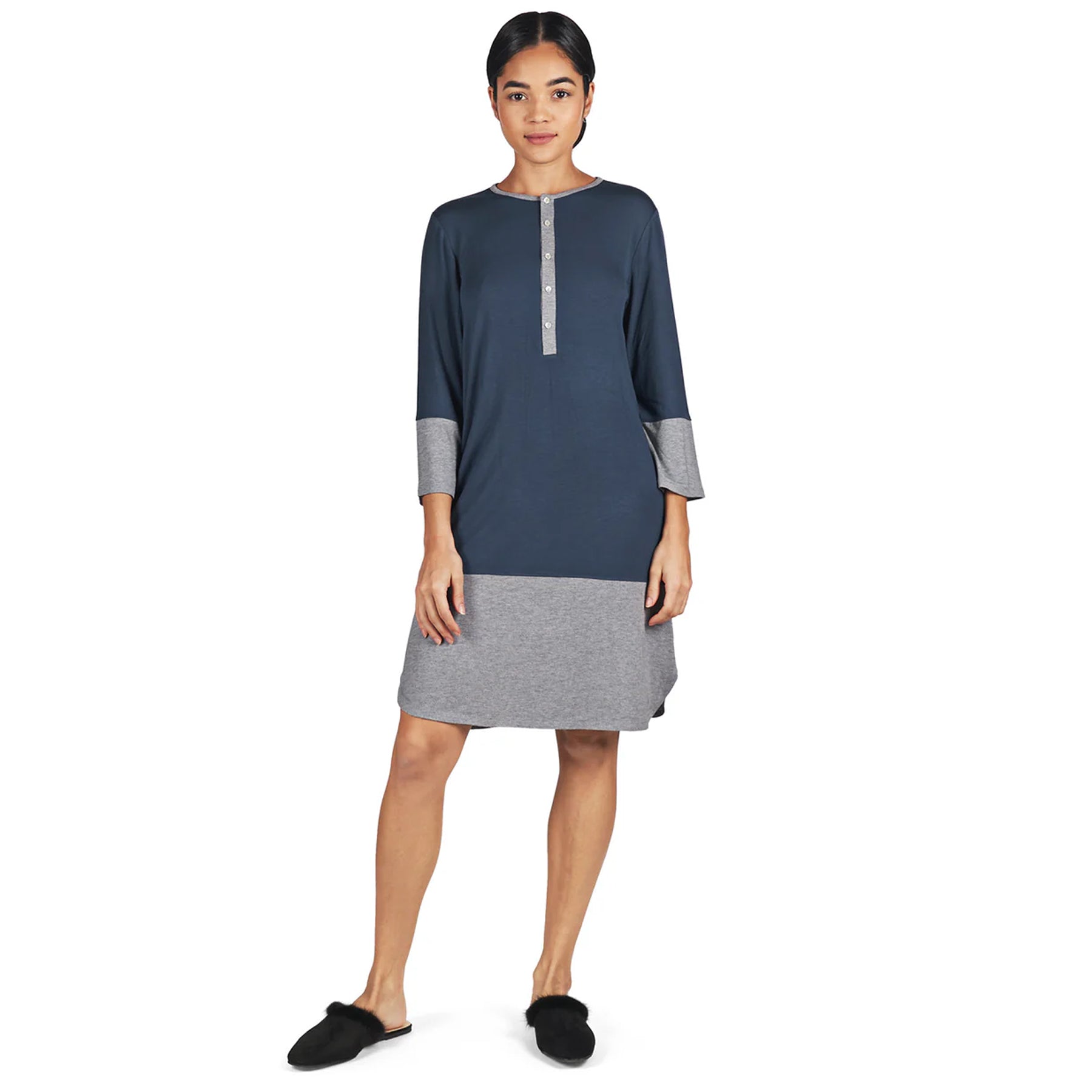 Front view of woman wearing midnight blue and heather grey colour-block nightshirt with button placket and 3/4 sleeves.
