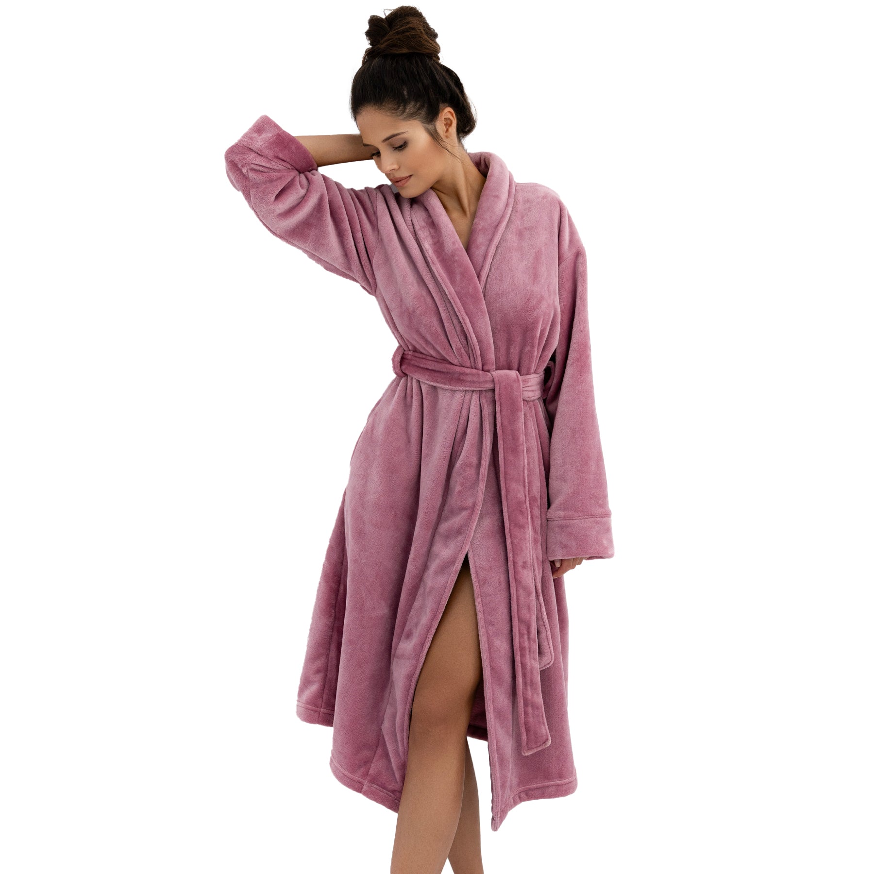 Woman wearing rose-coloured plush robe with shawl collar and self-tie belt, posing against a white background.